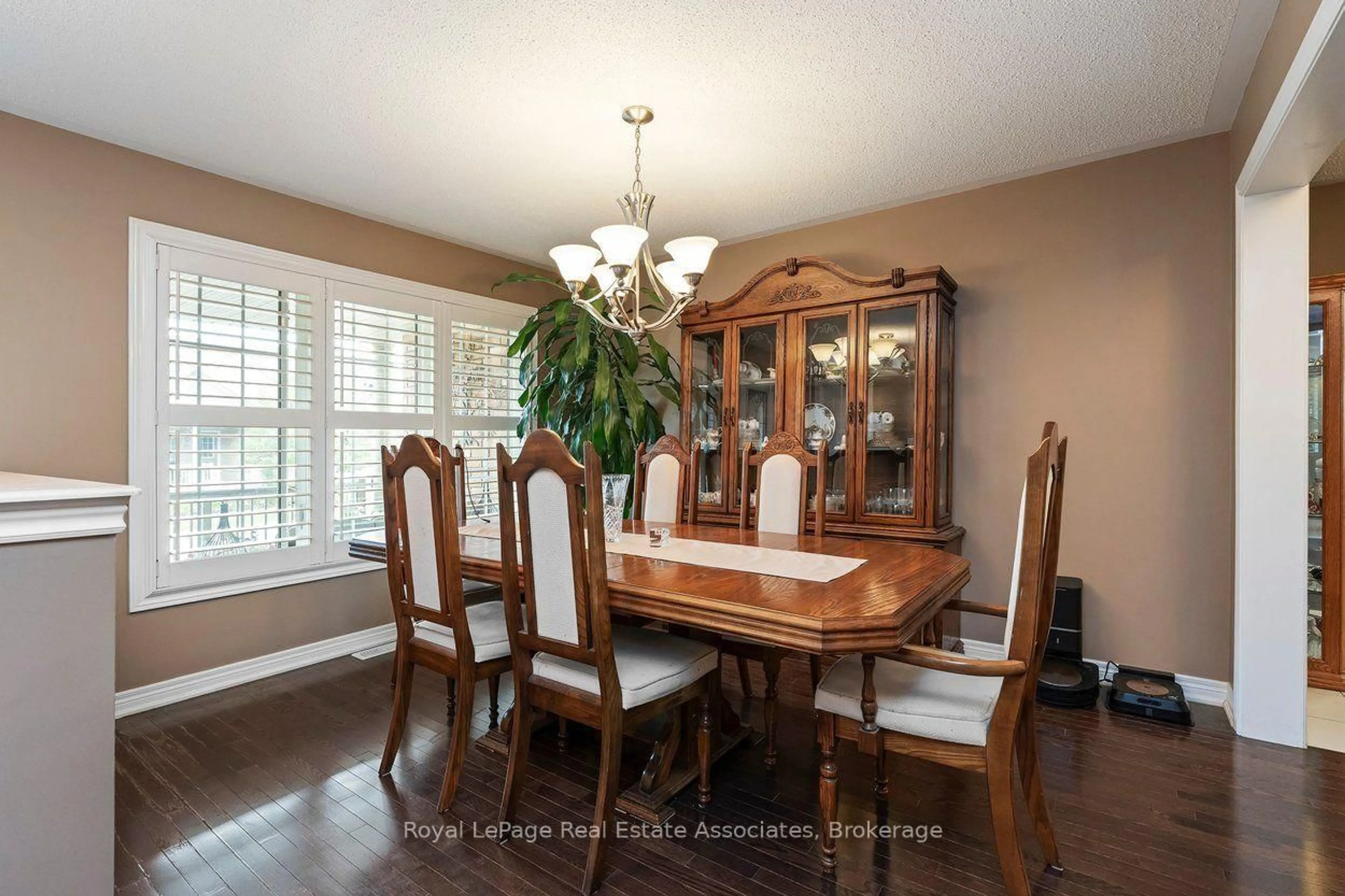Dining room, wood/laminate floor for 24 Lacorra Way, Brampton Ontario L6R 3P2