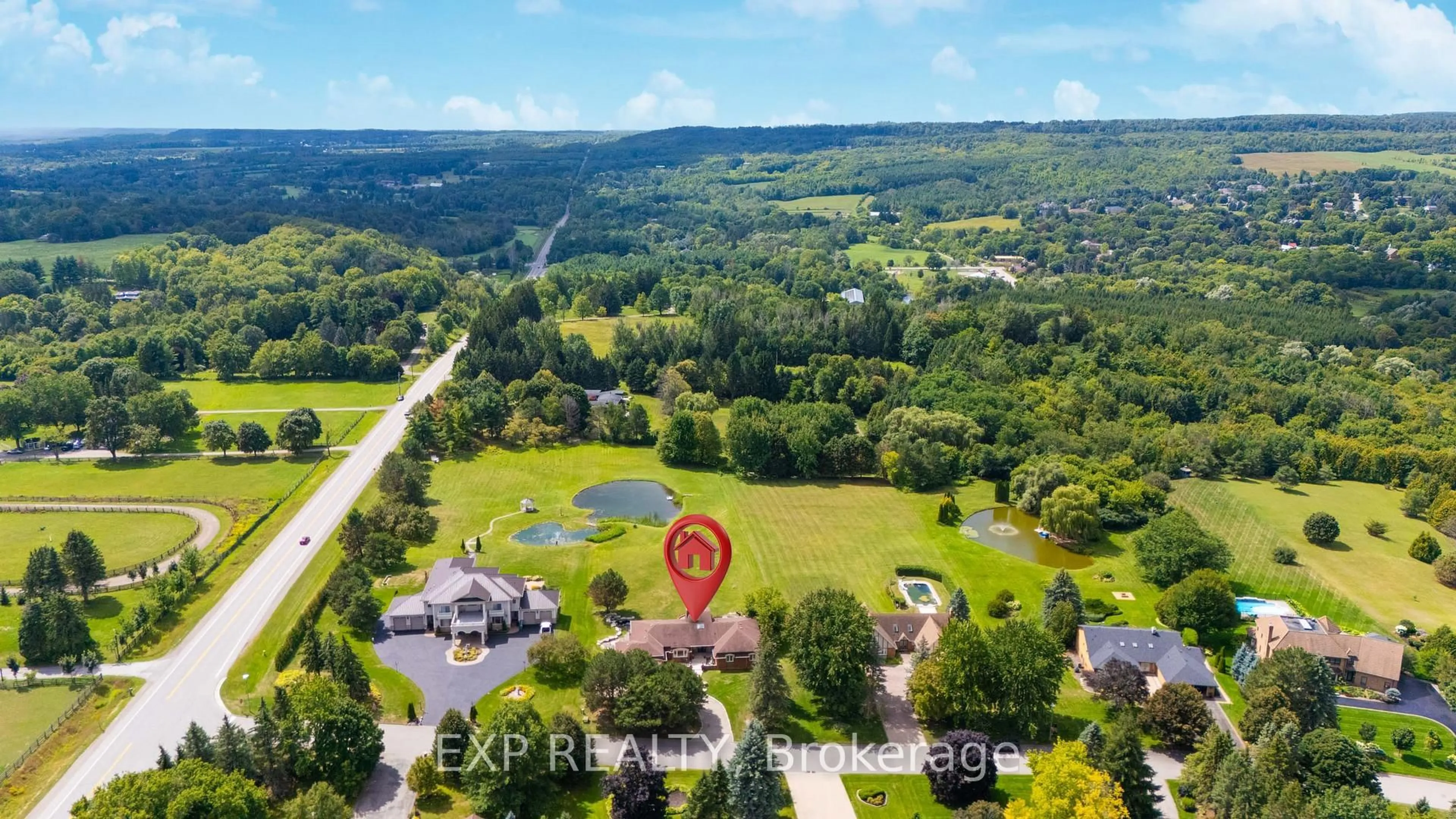A pic from outside/outdoor area/front of a property/back of a property/a pic from drone, water/lake/river/ocean view for 4 Ingleview Dr, Caledon Ontario L7C 1P3