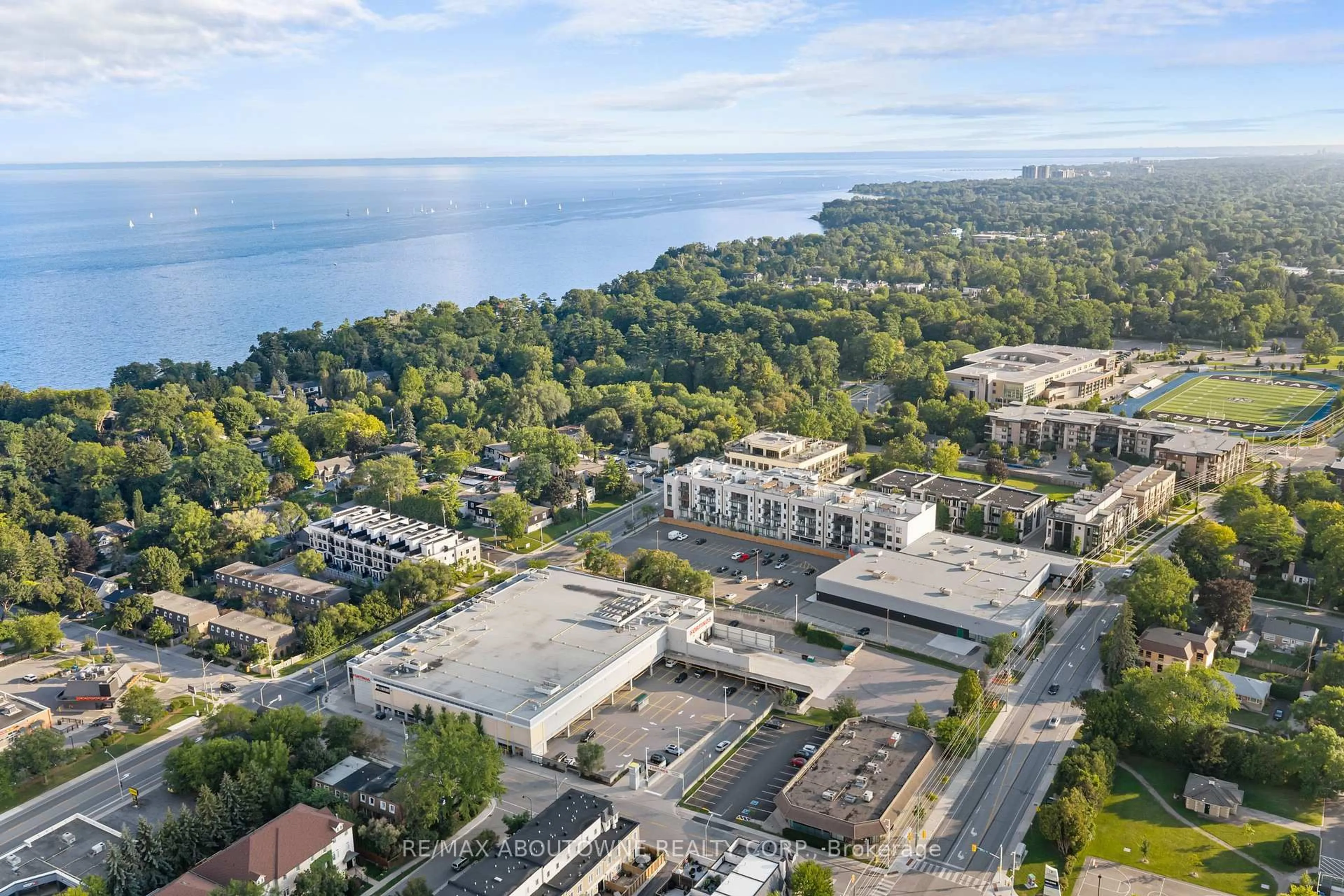 A pic from outside/outdoor area/front of a property/back of a property/a pic from drone, water/lake/river/ocean view for 123 Maurice Dr #214, Oakville Ontario L6K 2W6