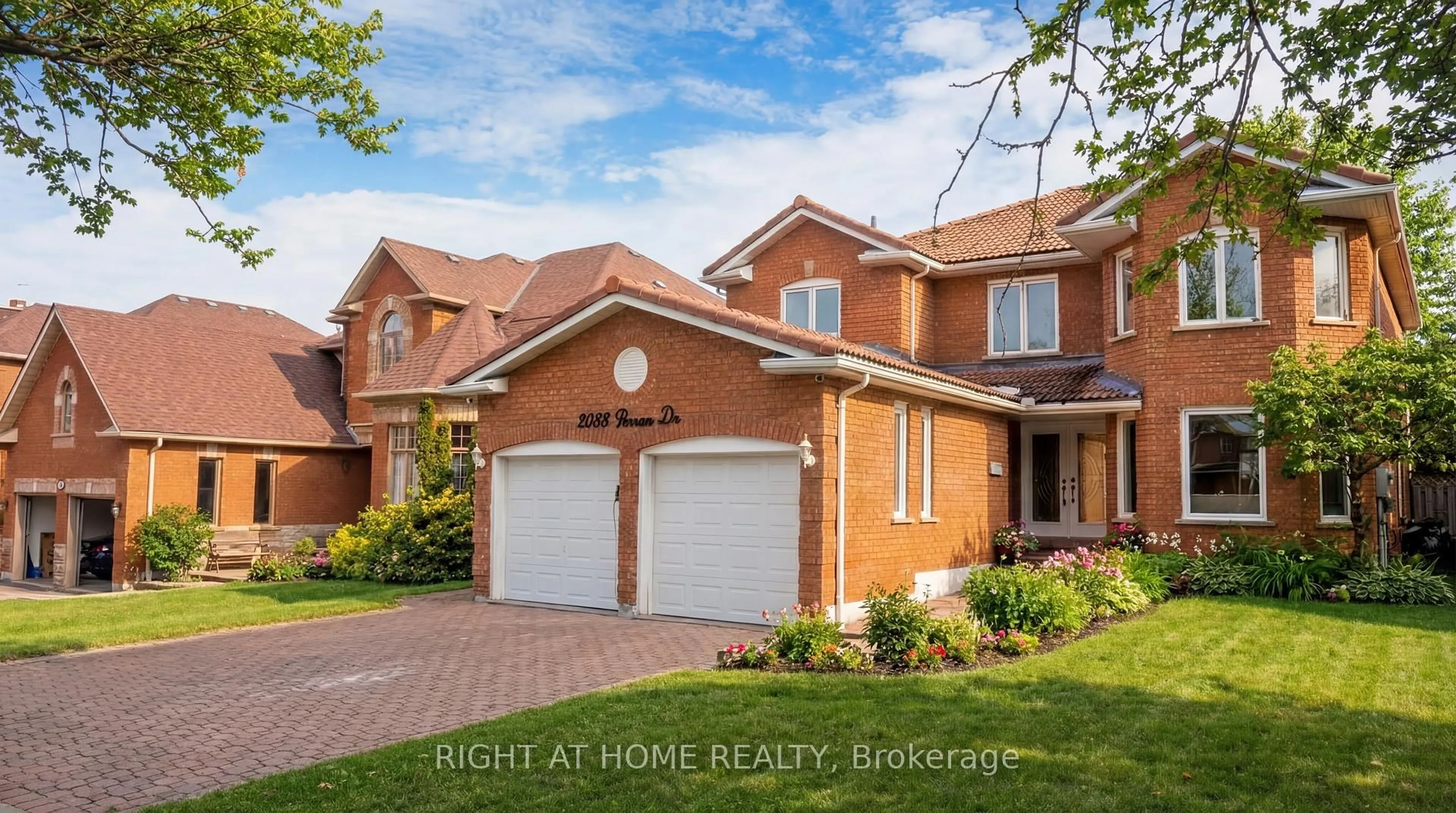 Home with brick exterior material, street for 2088 Perran Dr, Mississauga Ontario L5K 2R4