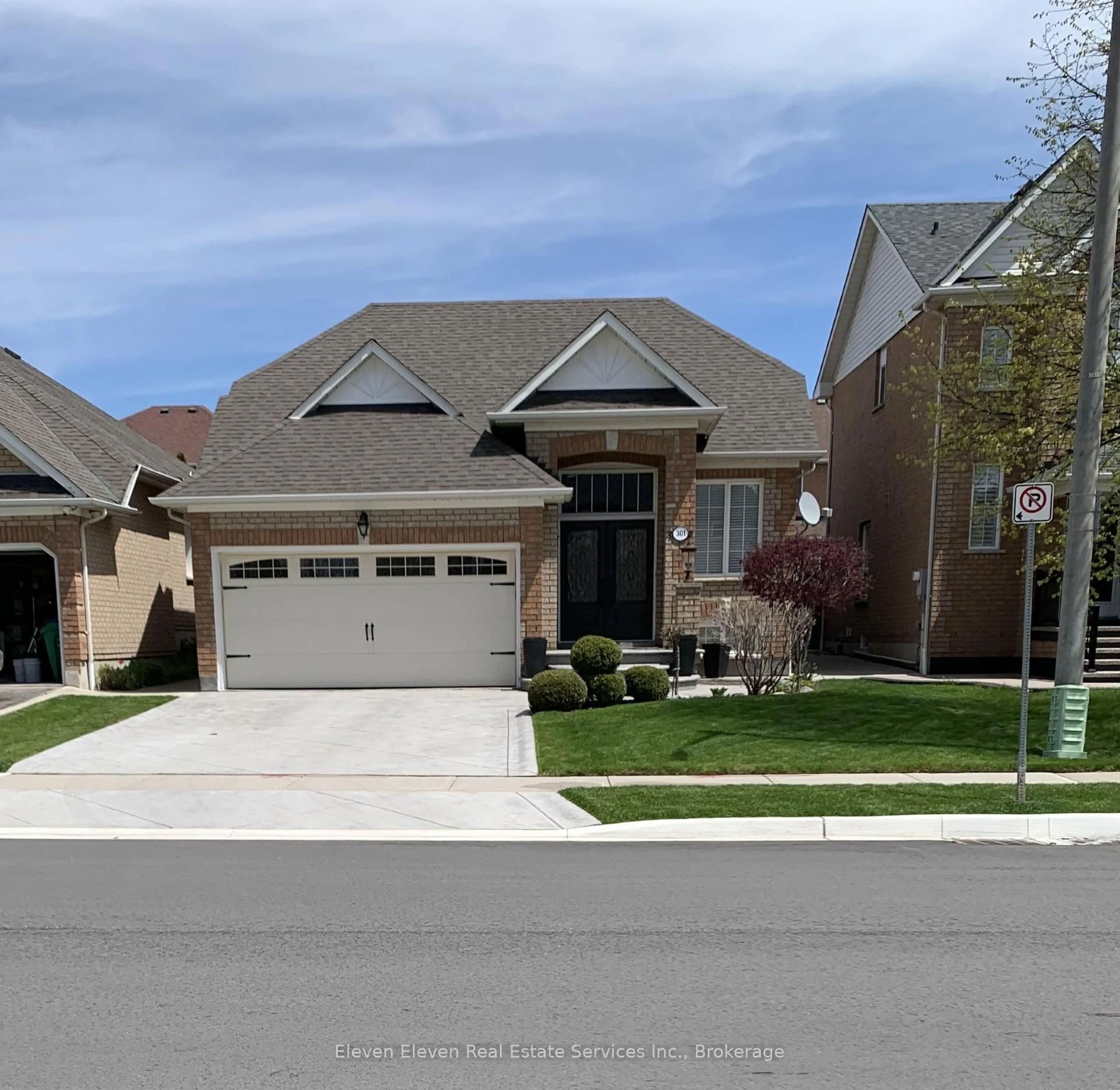 Home with brick exterior material, street for 301 Van Kirk Dr, Brampton Ontario L7A 1M3