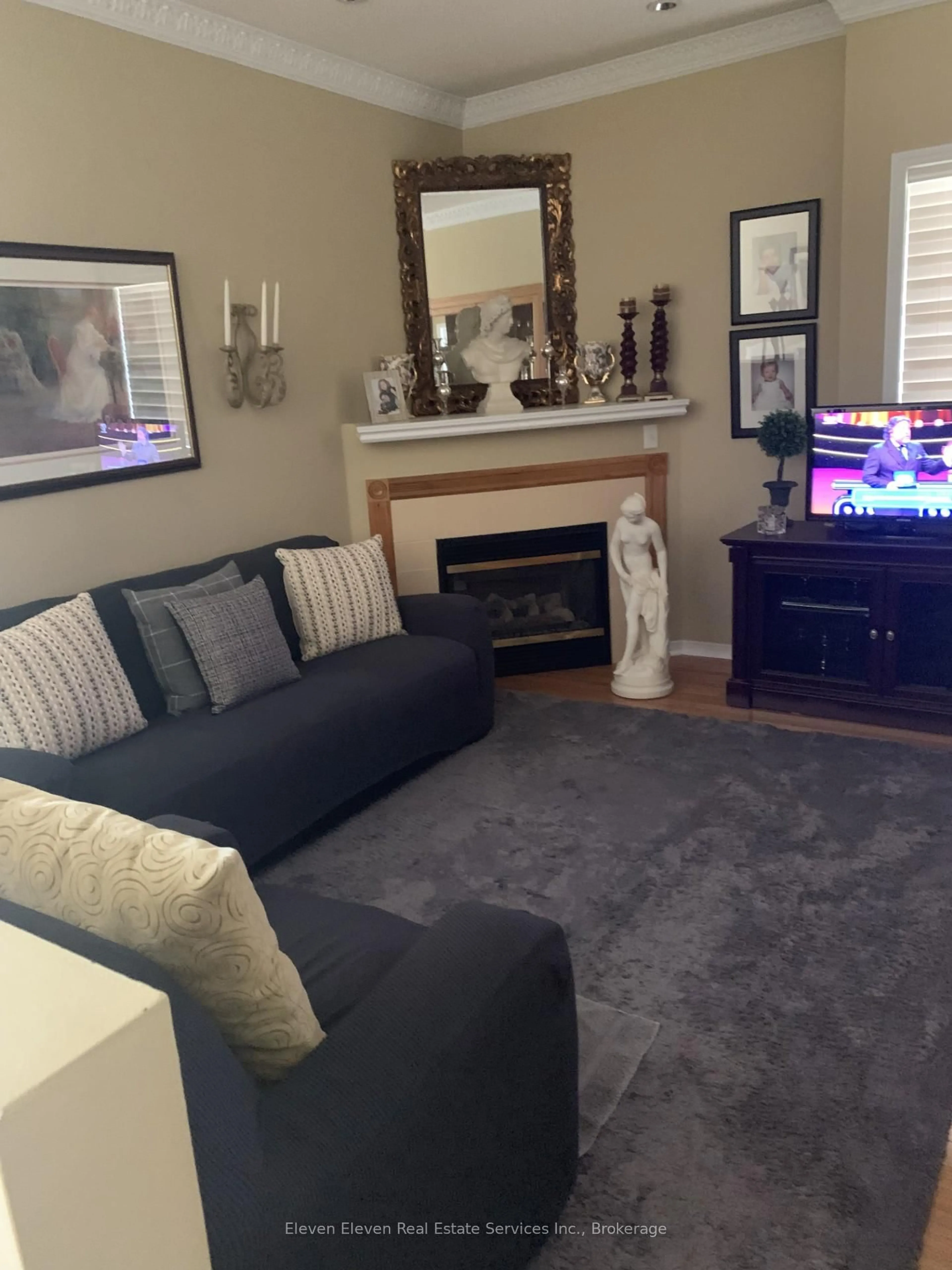 Living room with furniture, carpet floor for 301 Van Kirk Dr, Brampton Ontario L7A 1M3