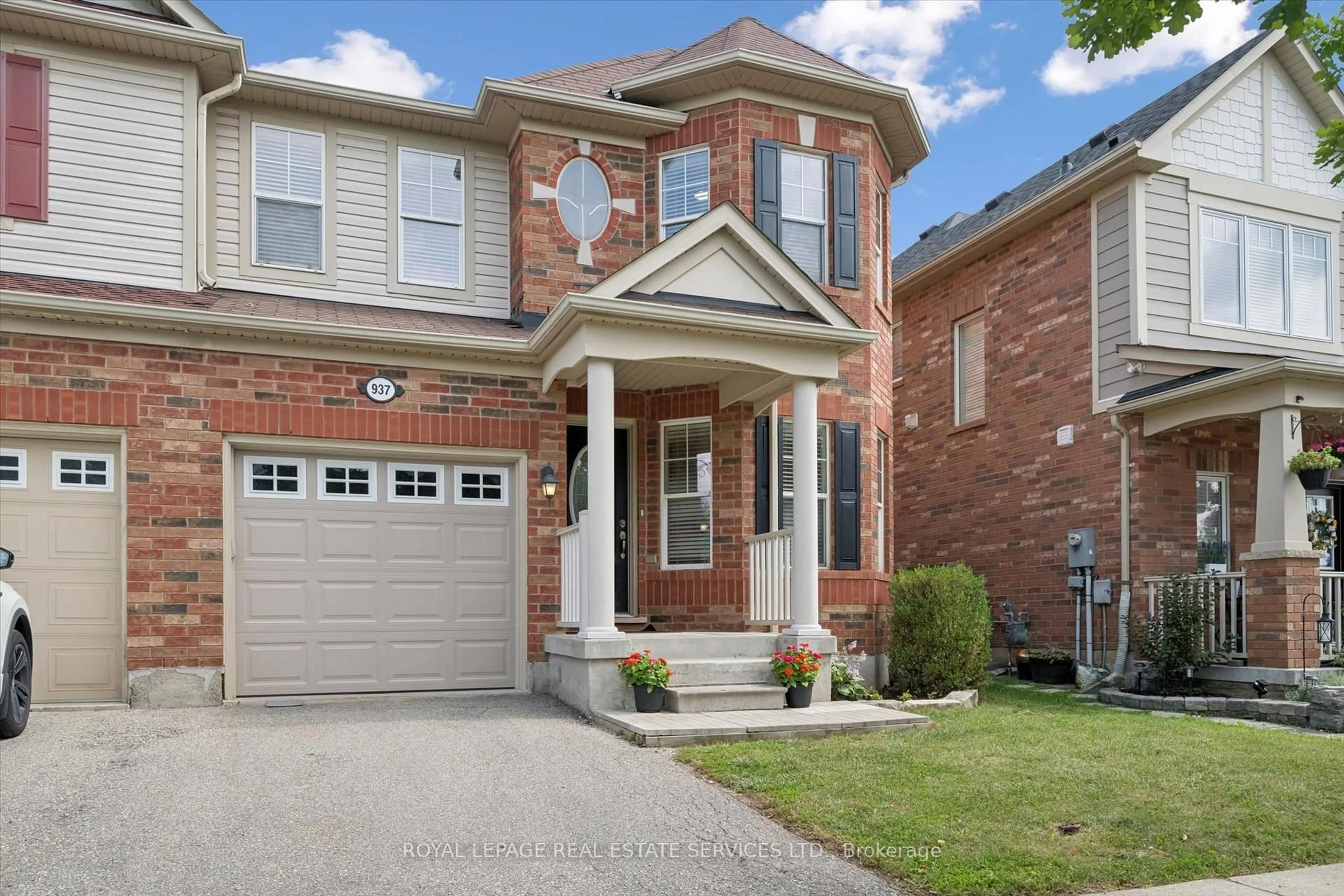 Home with brick exterior material, street for 937 Vickerman Way, Milton Ontario L9T 0K5