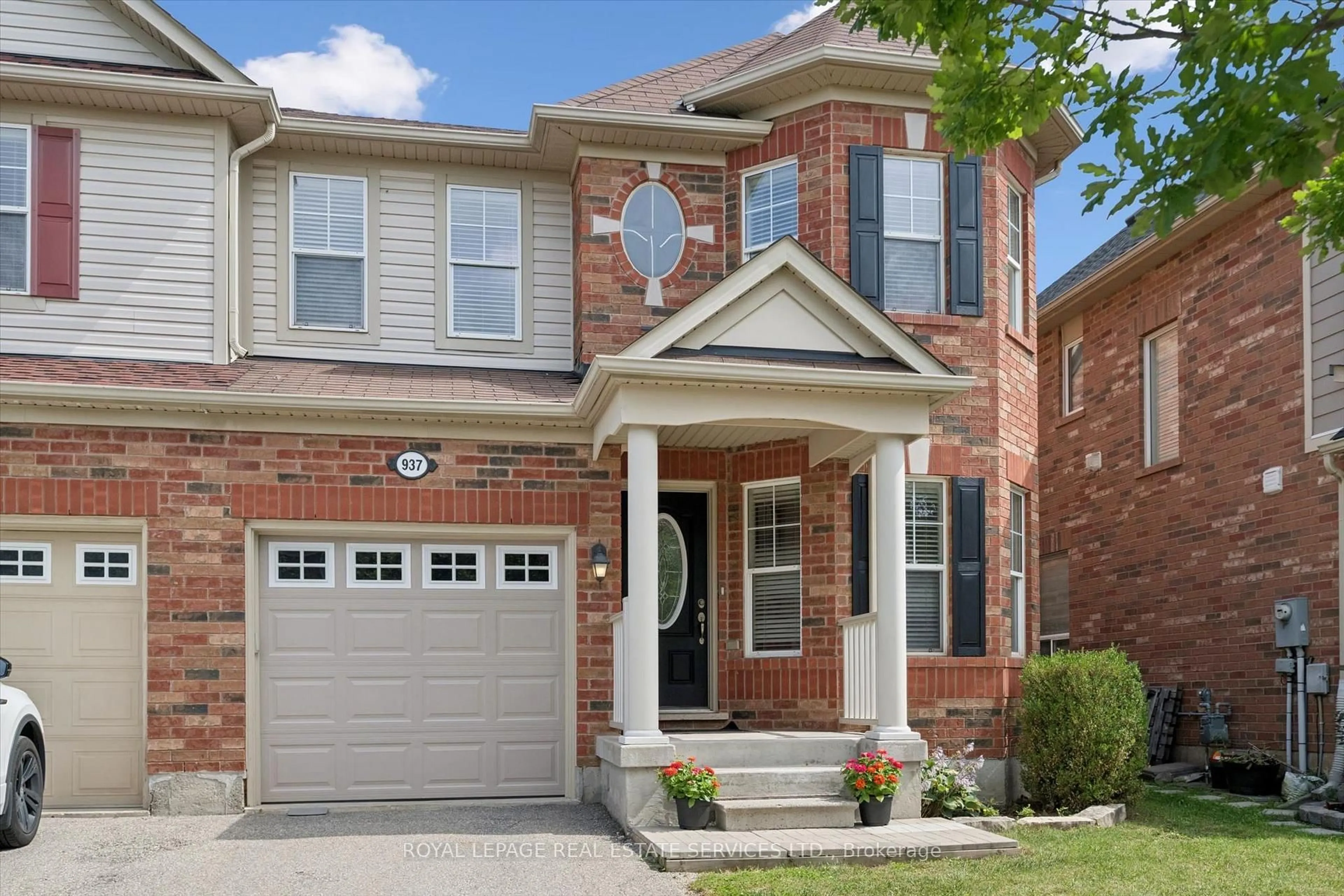 Home with brick exterior material, street for 937 Vickerman Way, Milton Ontario L9T 0K5
