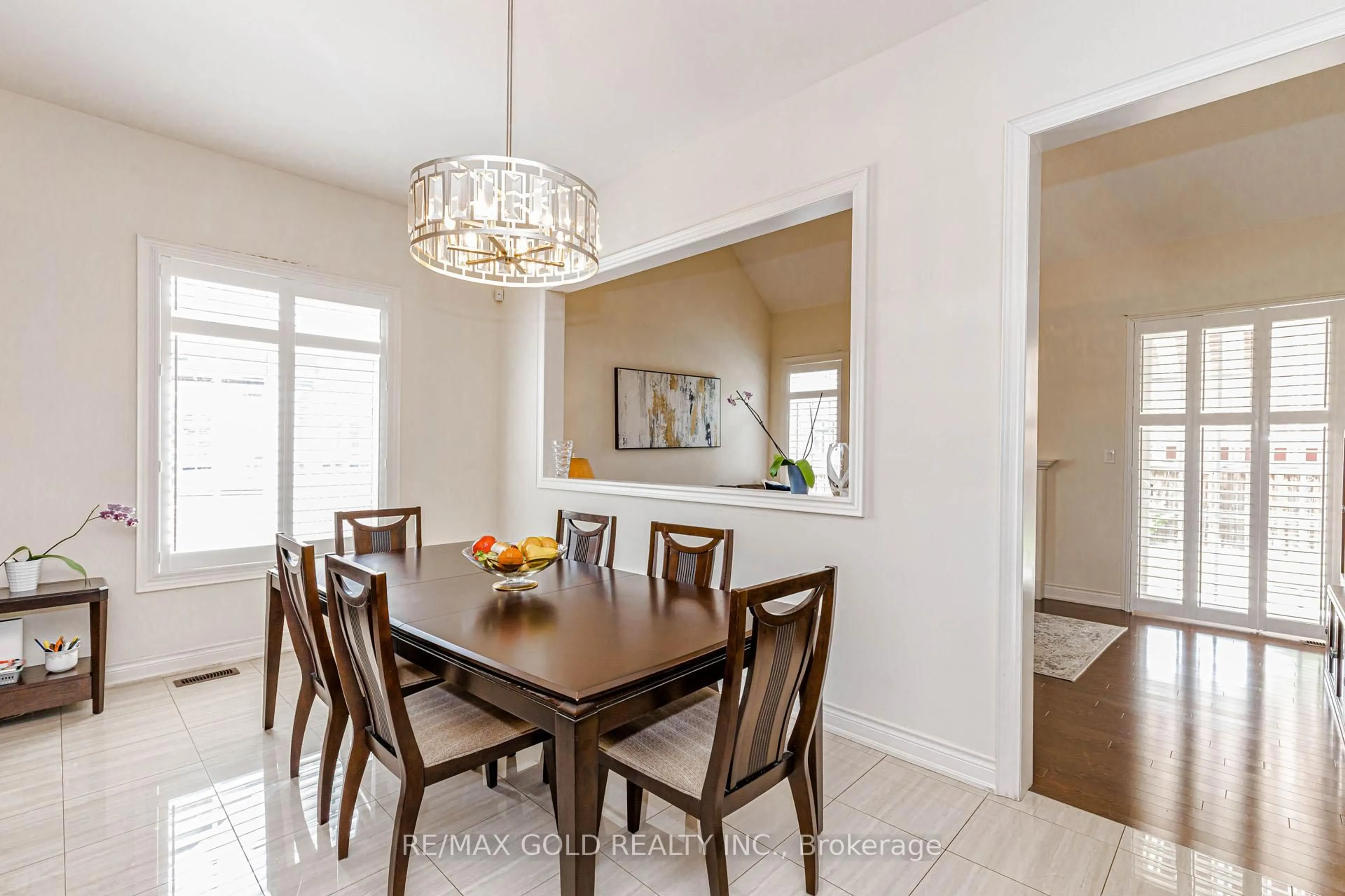 Dining room, wood/laminate floor for 10 Falkland Rd, Brampton Ontario L6P 4C3
