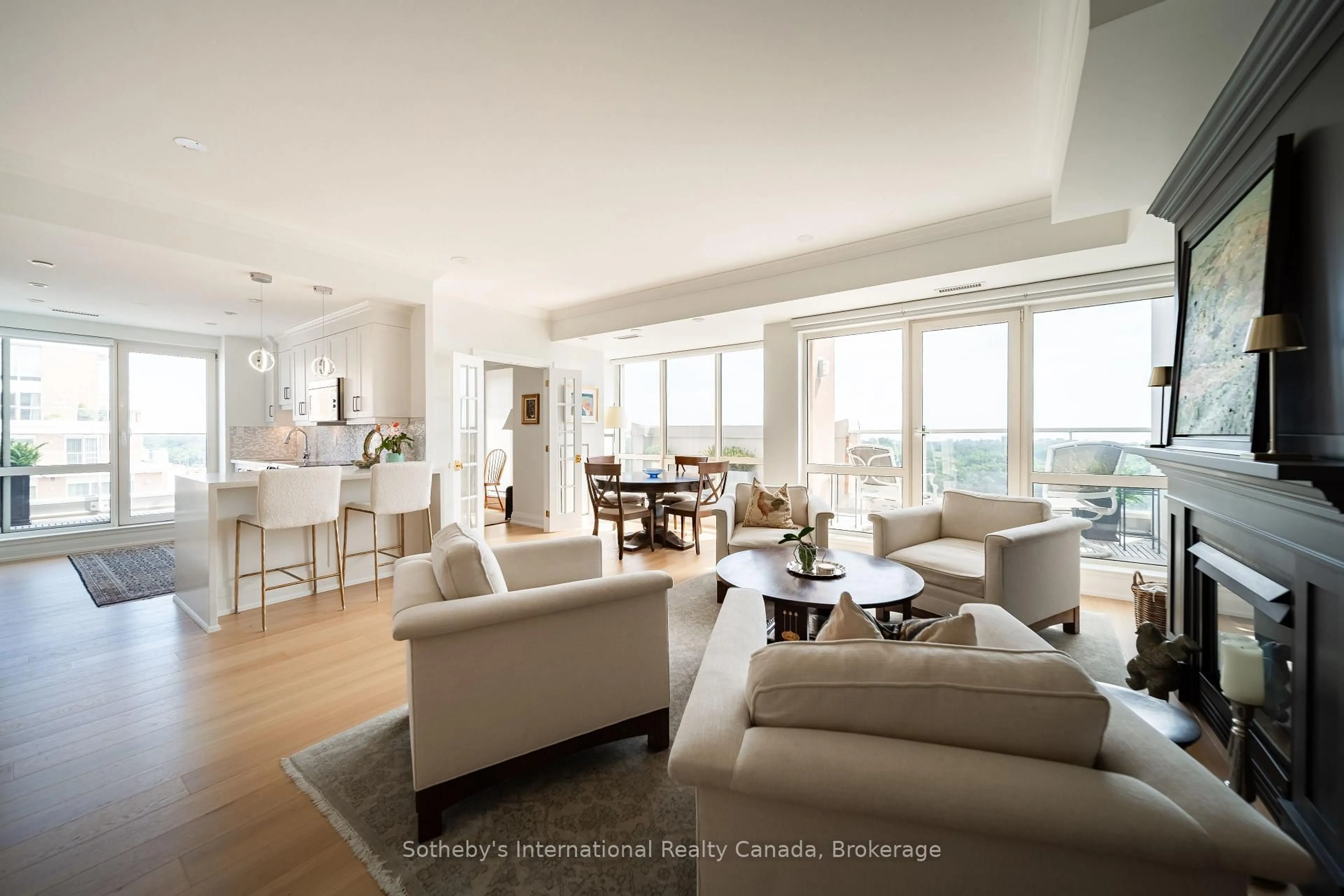 Living room with furniture, wood/laminate floor for 50 Old Mill Rd #901, Oakville Ontario L6J 7W1