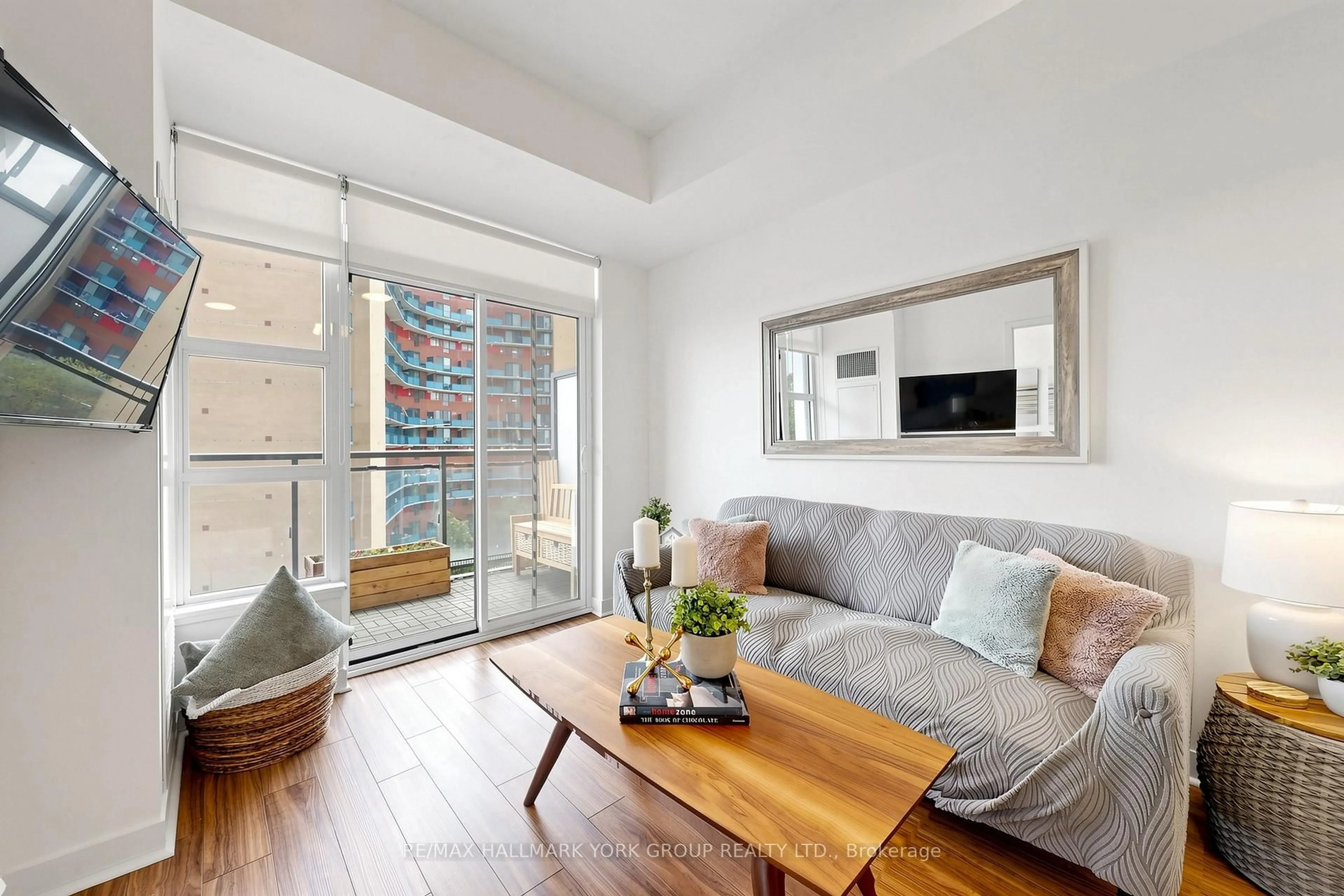Living room with furniture, unknown for 840 Queen's Plate Dr #612, Toronto Ontario M9W 0E7