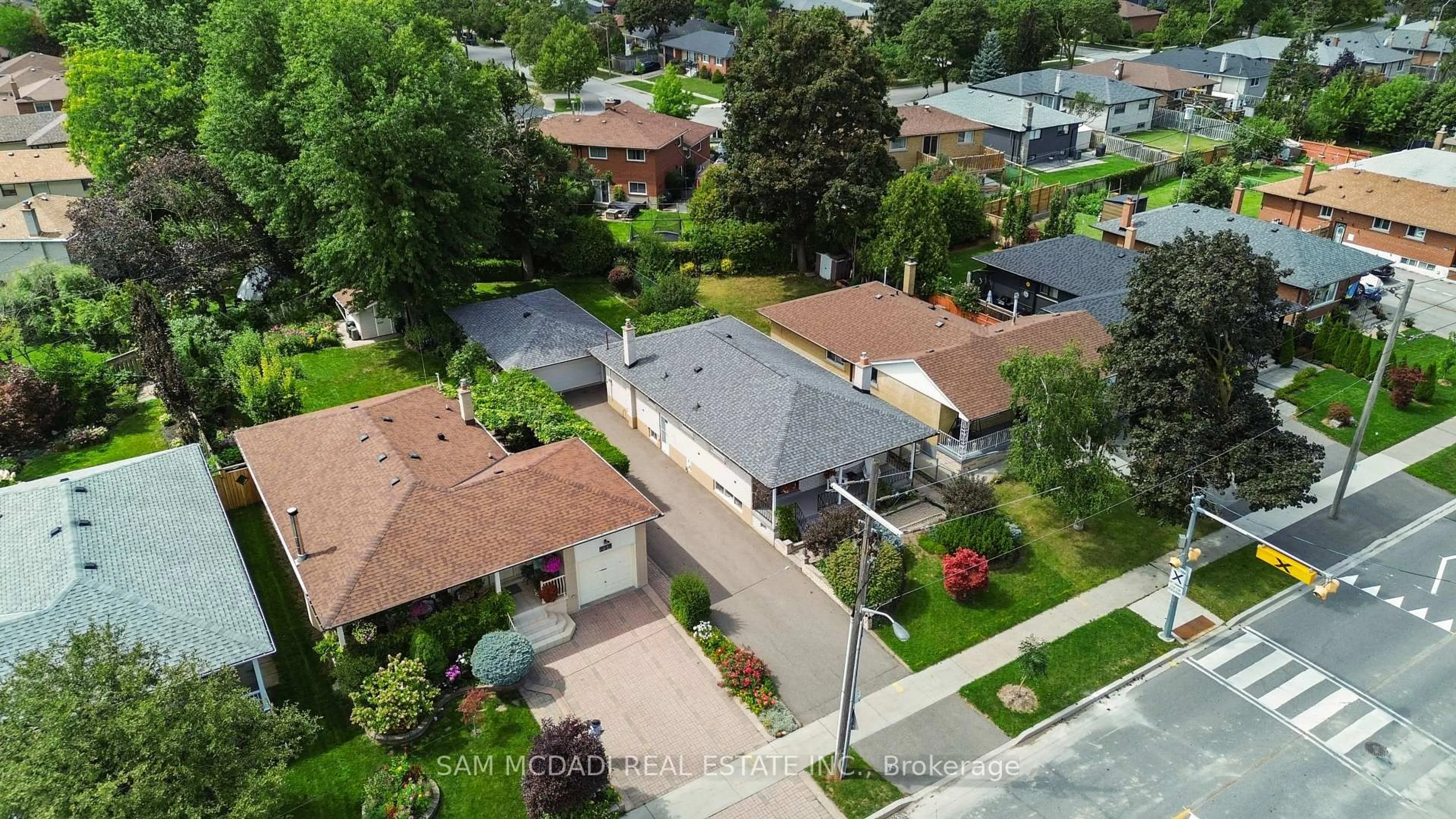 A pic from outside/outdoor area/front of a property/back of a property/a pic from drone, street for 248 Wellesworth Dr, Toronto Ontario M9C 4S6