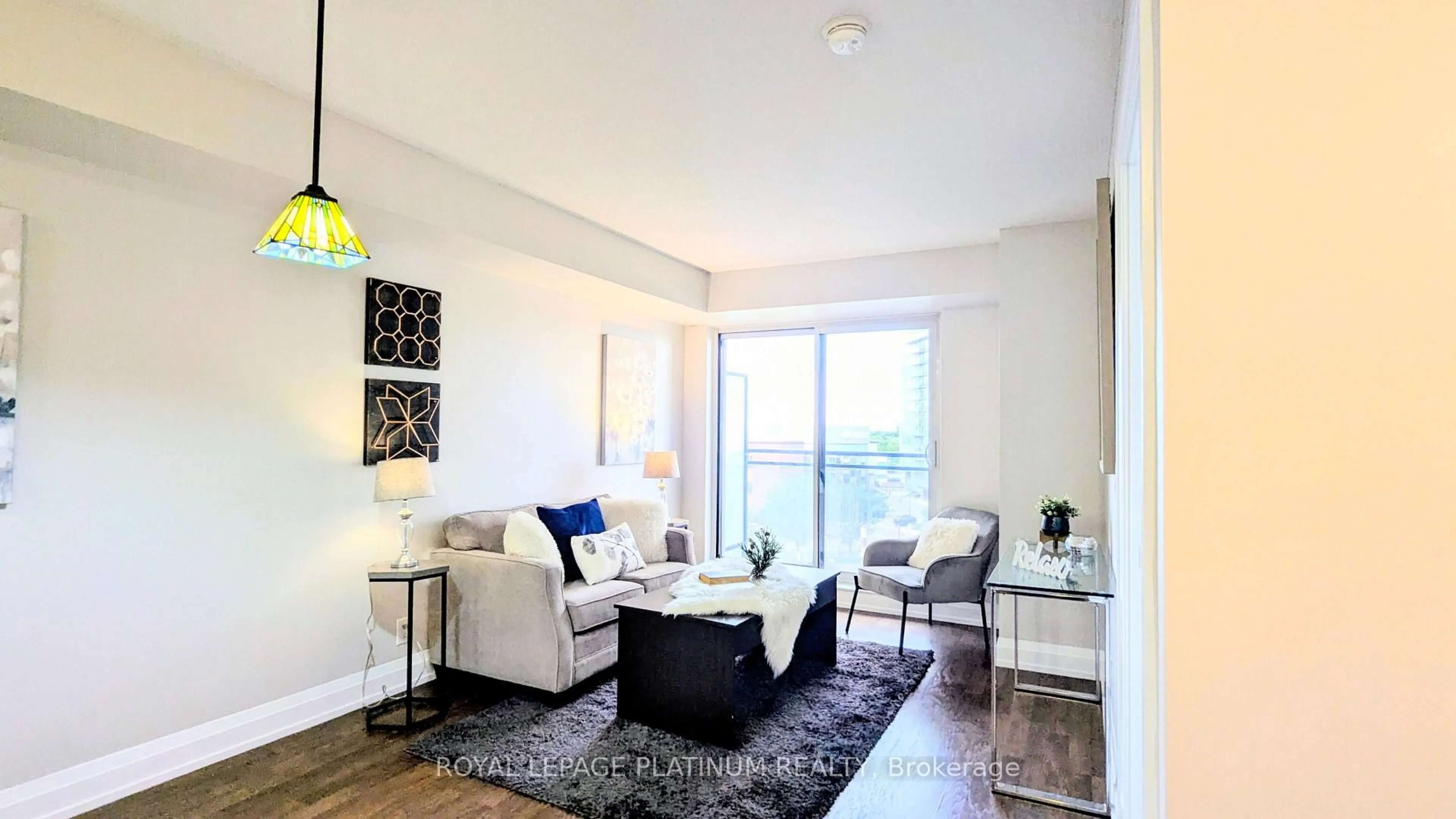 Living room with furniture, wood/laminate floor for 1070 Sheppard Ave #503, Toronto Ontario M3J 0G8