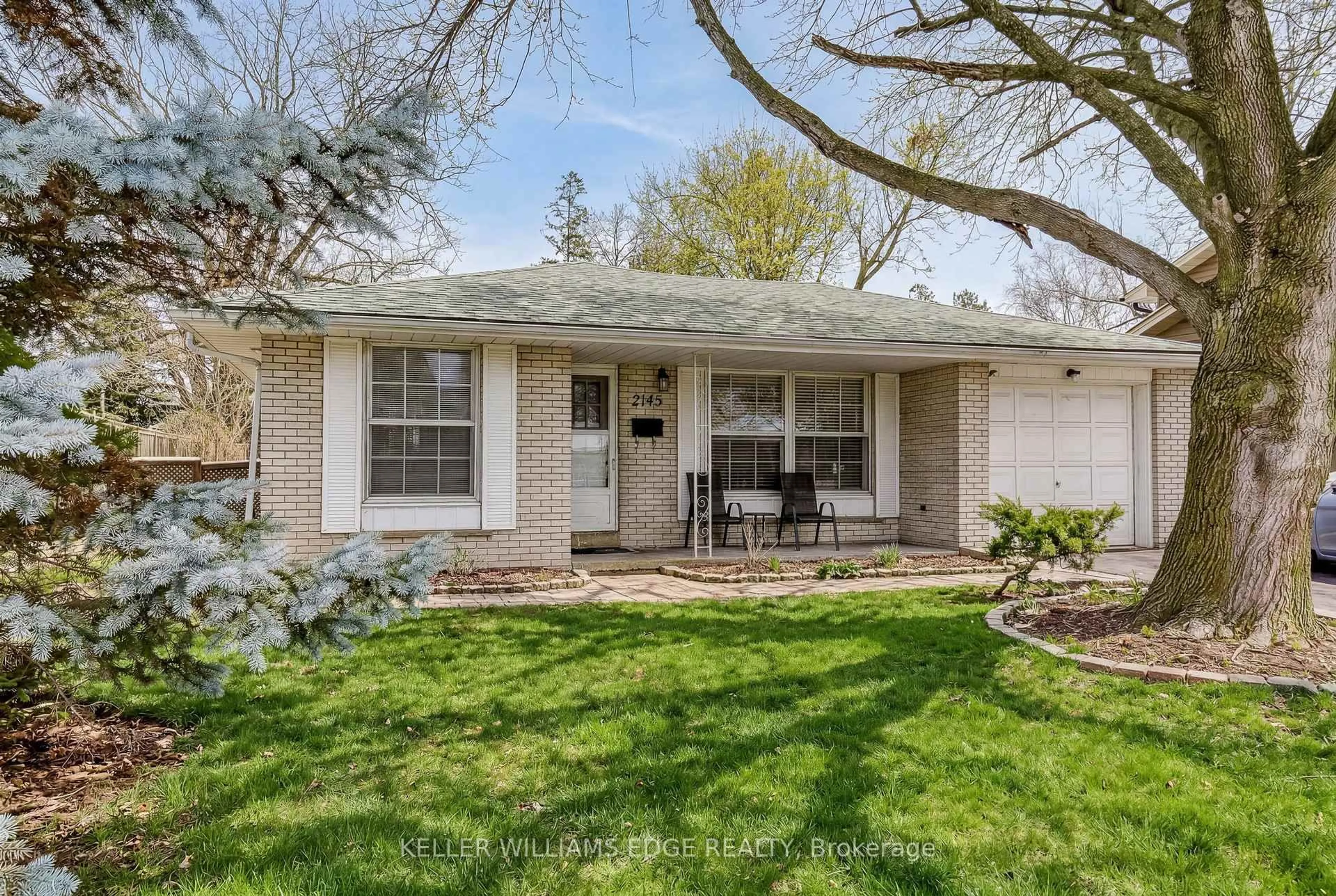 Home with vinyl exterior material, street for 2145 Sandringham Dr, Burlington Ontario L7P 1T8