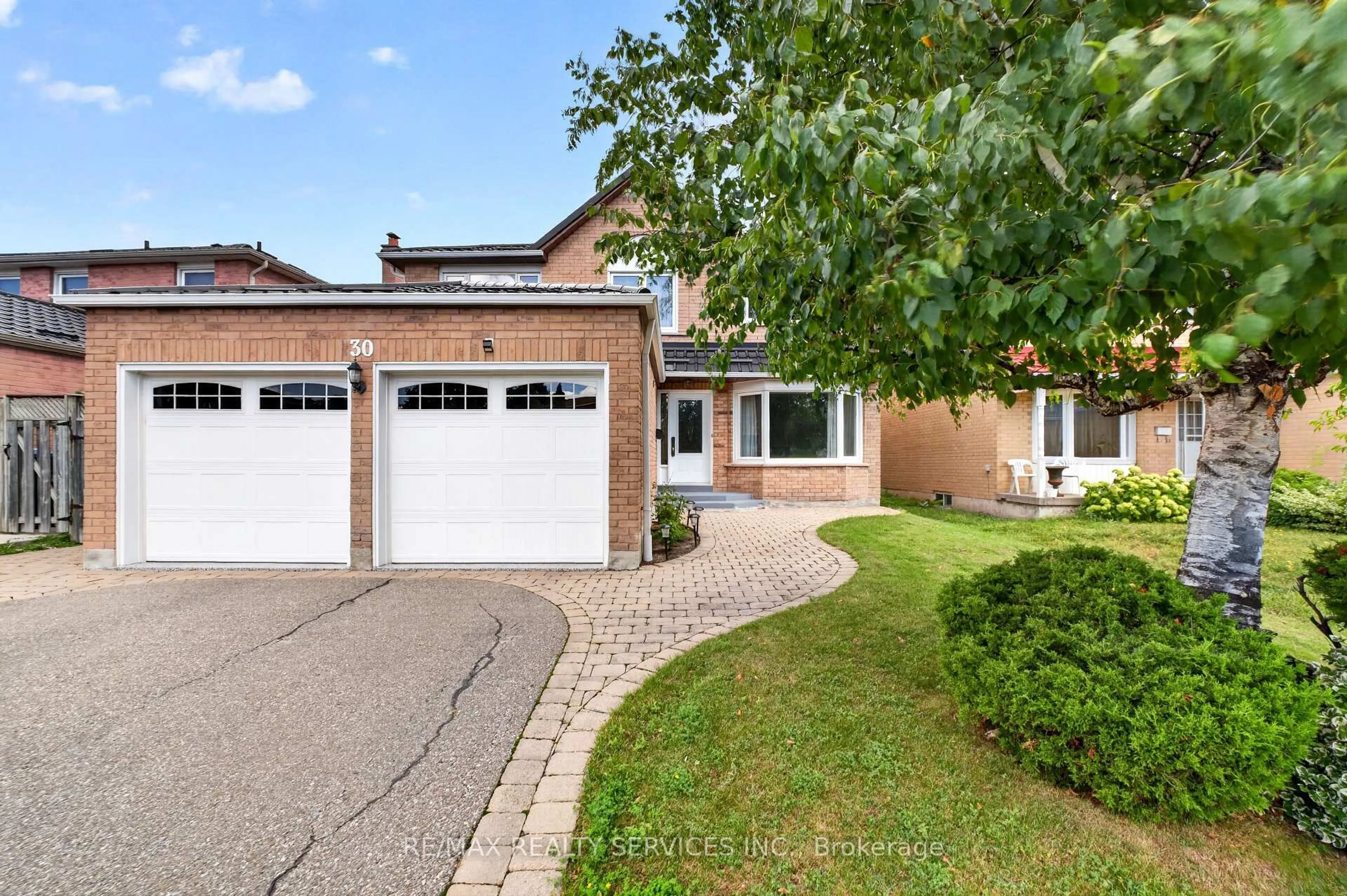 Home with brick exterior material, street for 30 Nasmith St, Brampton Ontario L6S 4Z2