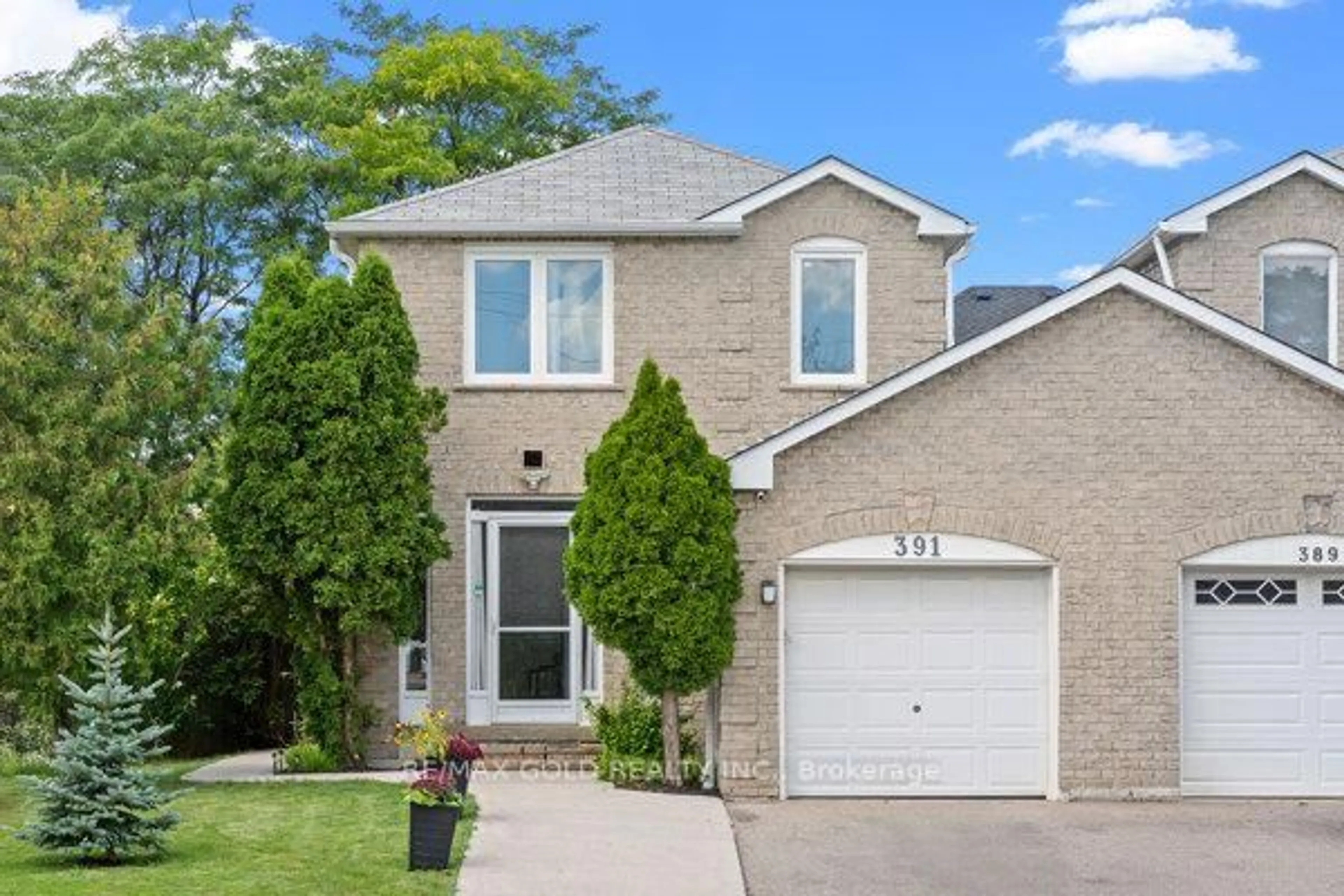 Home with brick exterior material, street for 391 Assiniboine Tr, Mississauga Ontario L5R 2E6