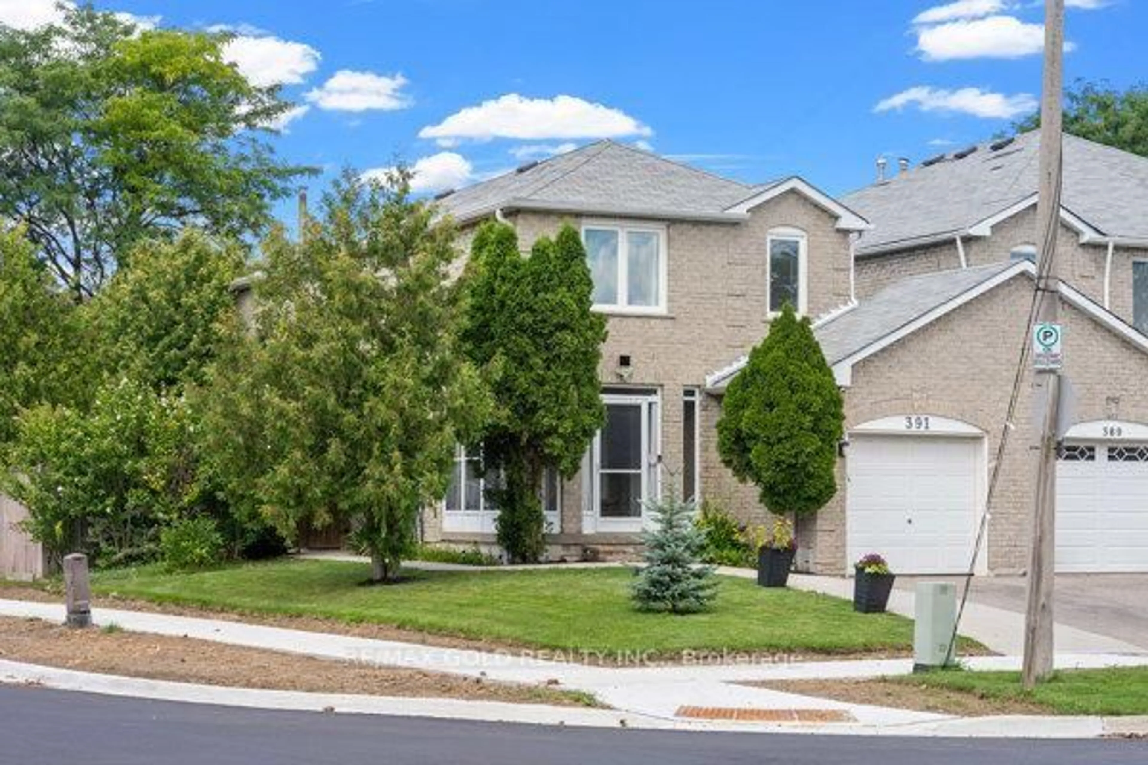 Home with brick exterior material, street for 391 Assiniboine Tr, Mississauga Ontario L5R 2E6