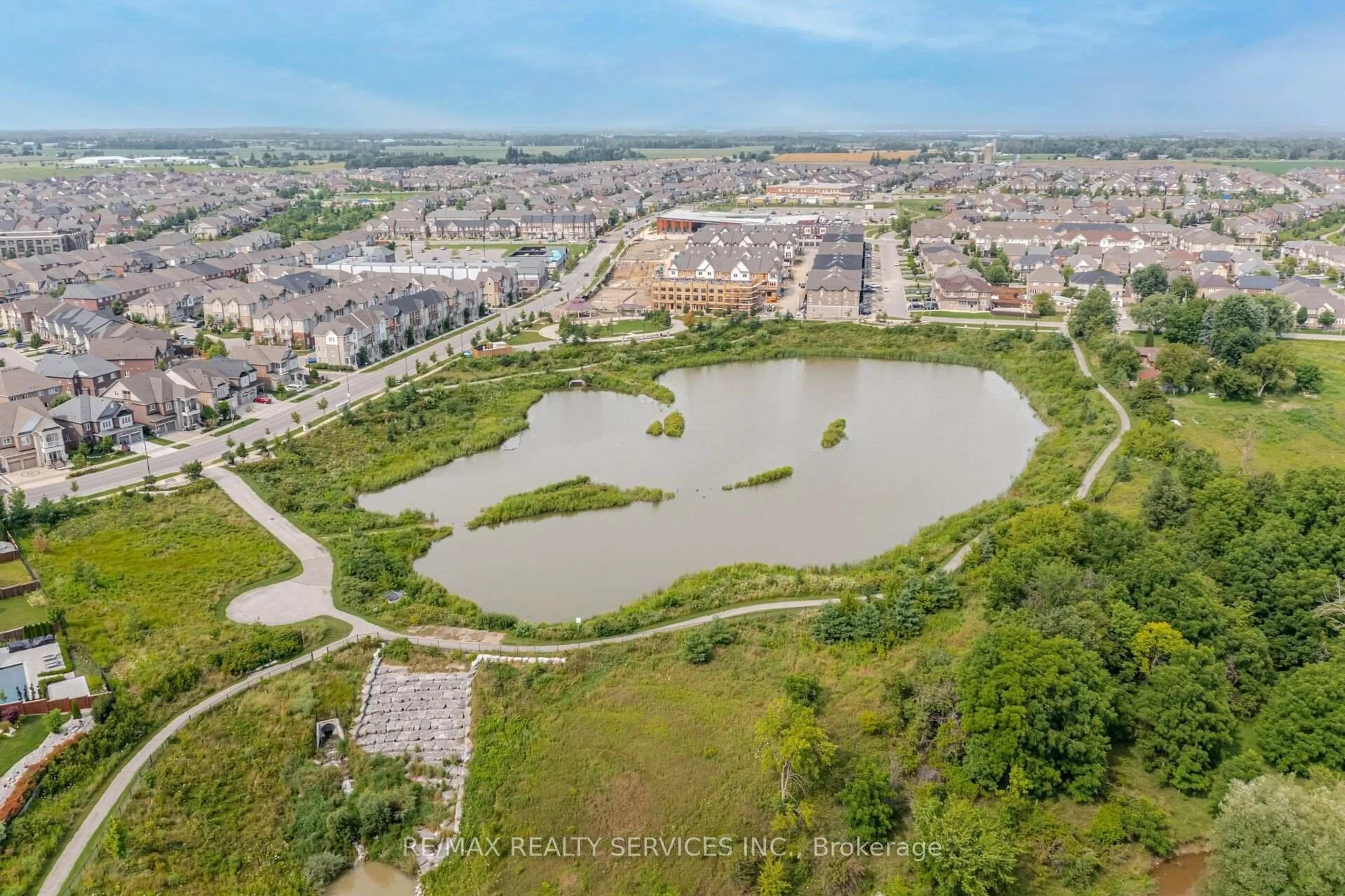 A pic from outside/outdoor area/front of a property/back of a property/a pic from drone, water/lake/river/ocean view for 20 Cedarcrest St, Caledon Ontario L7C 3P9