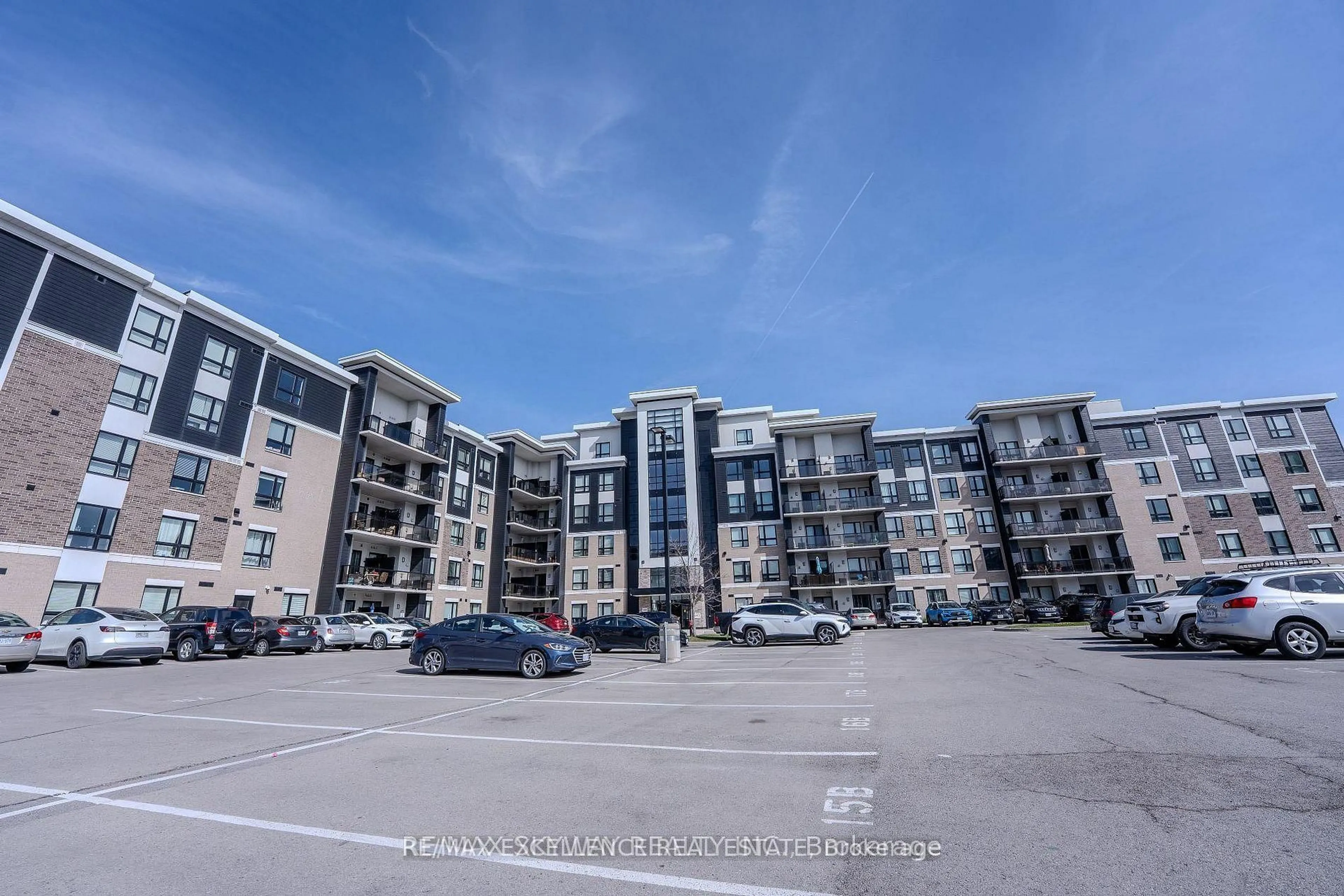 A pic from outside/outdoor area/front of a property/back of a property/a pic from drone, building for 640 Sauve St #420, Milton Ontario L9T 9A7