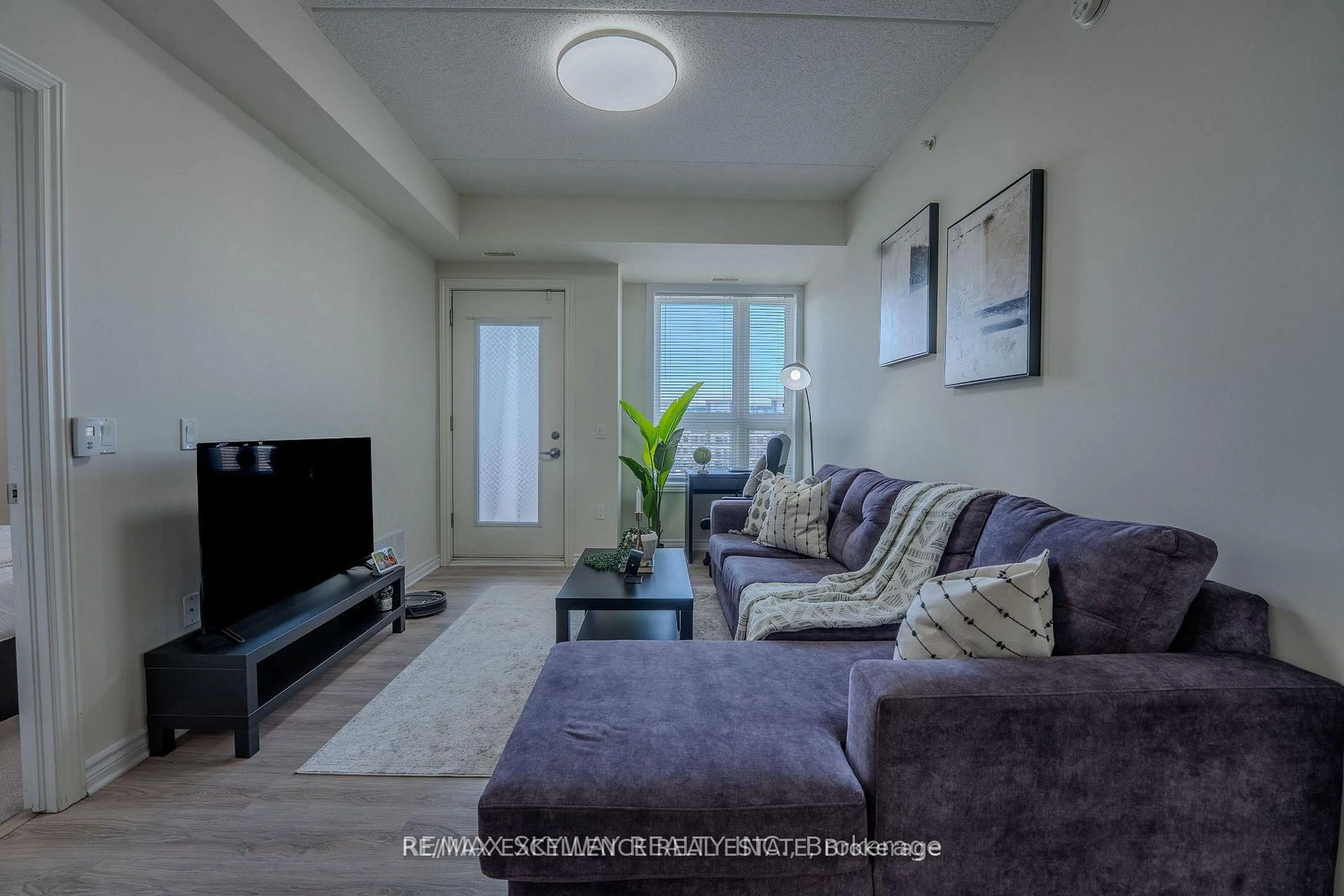 Living room with furniture, unknown for 640 Sauve St #420, Milton Ontario L9T 9A7