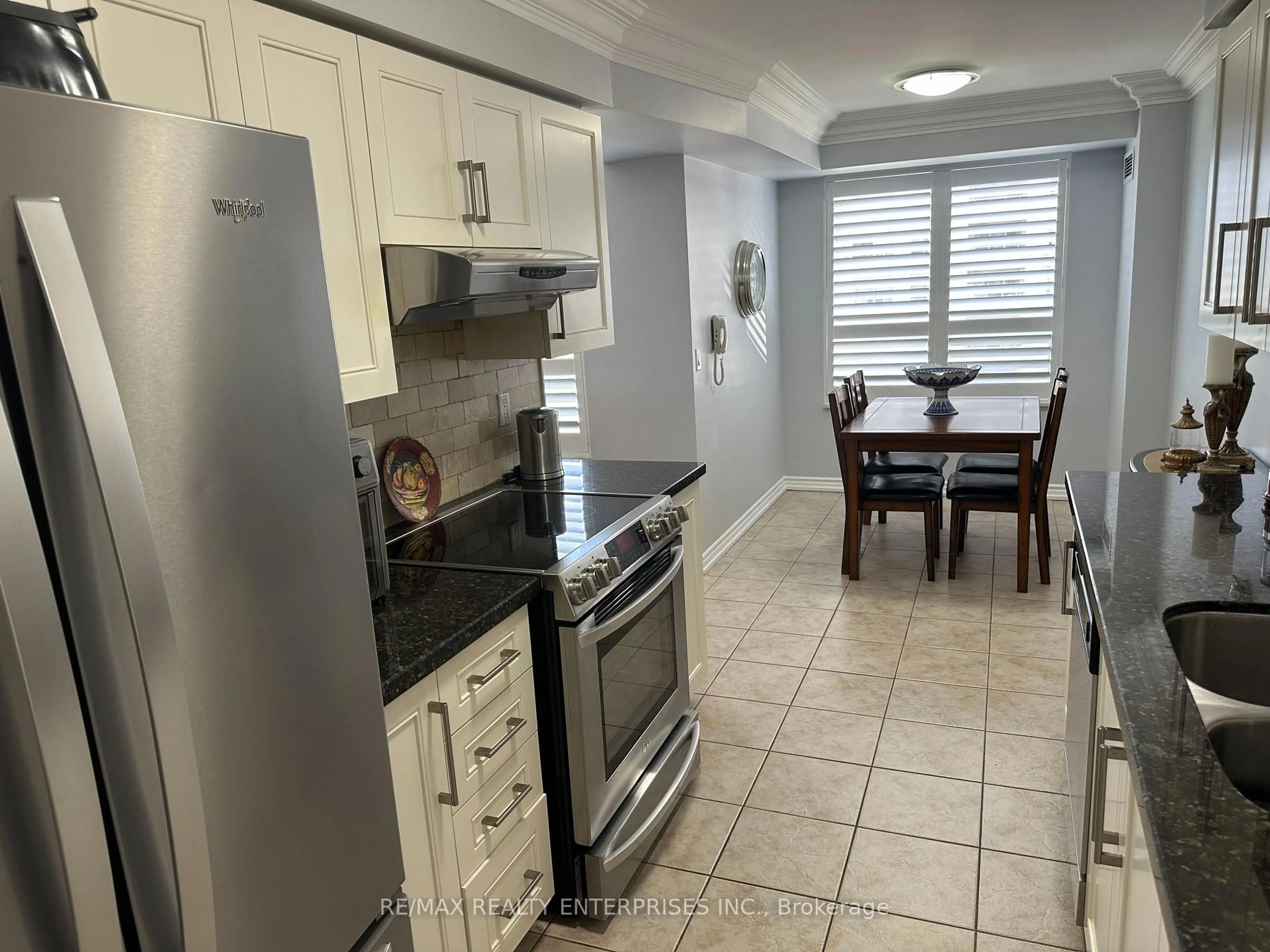 Standard kitchen, ceramic/tile floor for 35 Kingsbridge Garden Circ #711, Mississauga Ontario L5R 3Z5