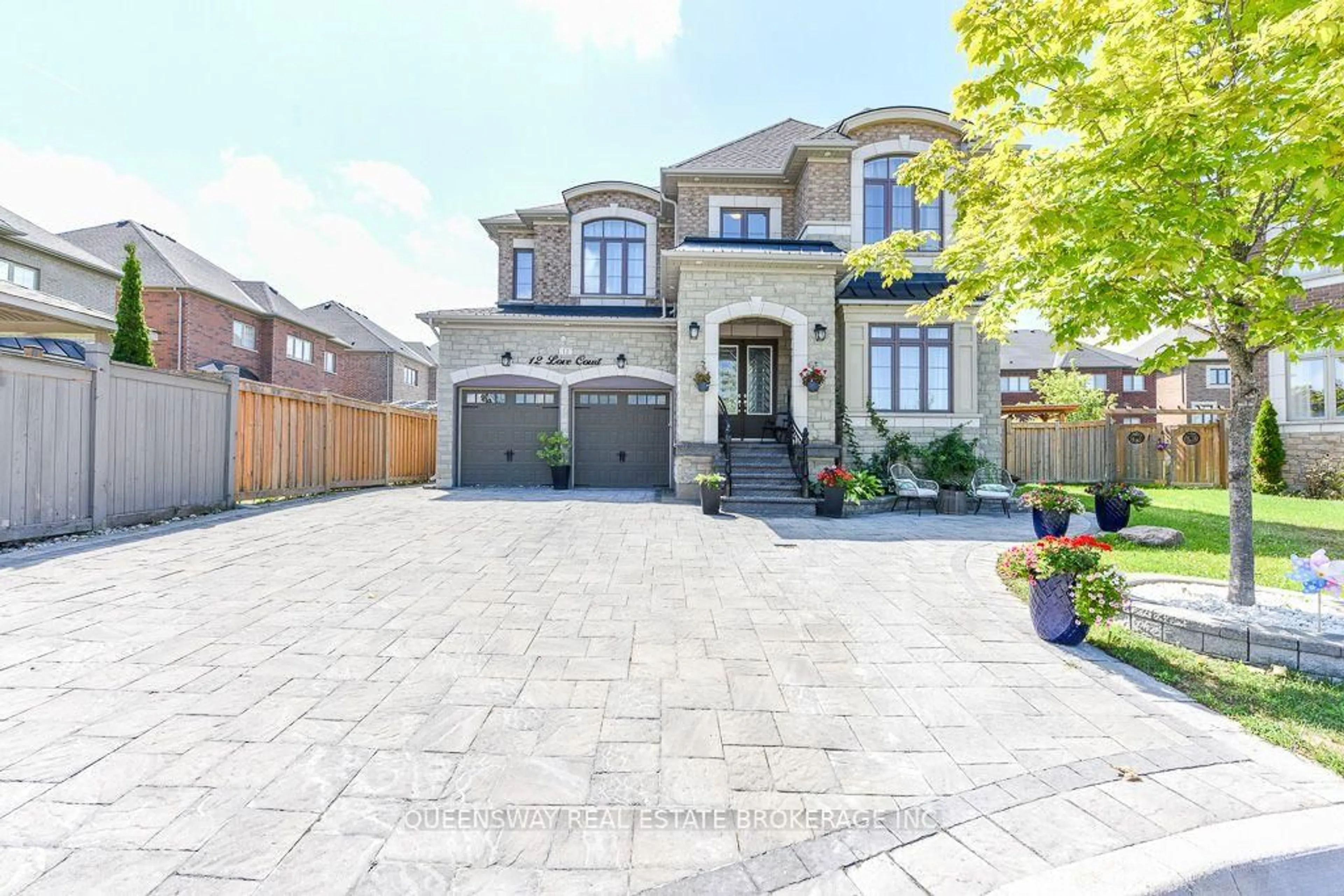 Home with brick exterior material, street for 12 Love Crt, Brampton Ontario L6P 4H6