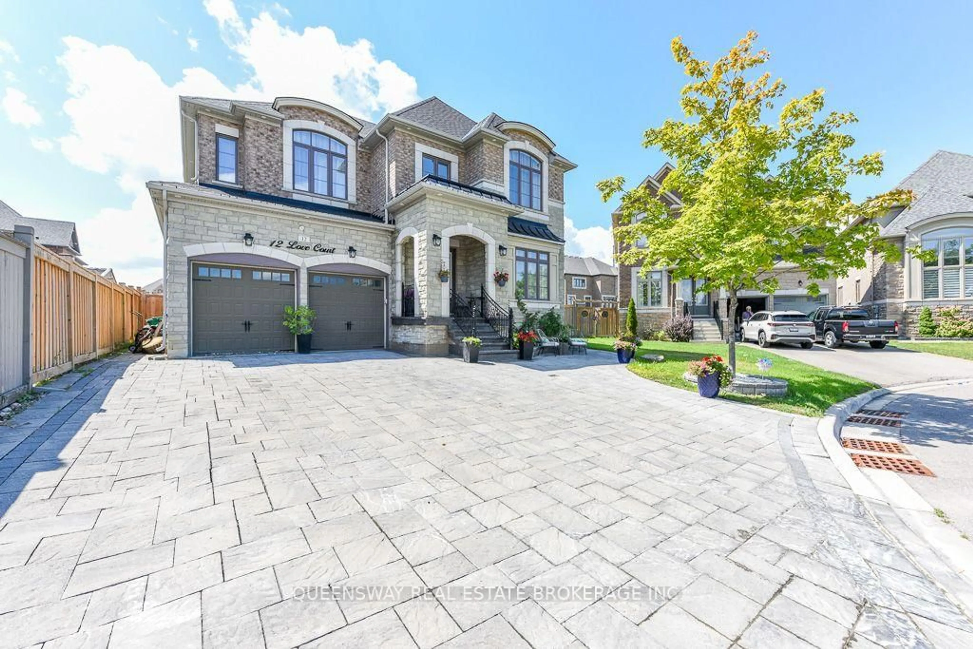 Home with brick exterior material, street for 12 Love Crt, Brampton Ontario L6P 4H6
