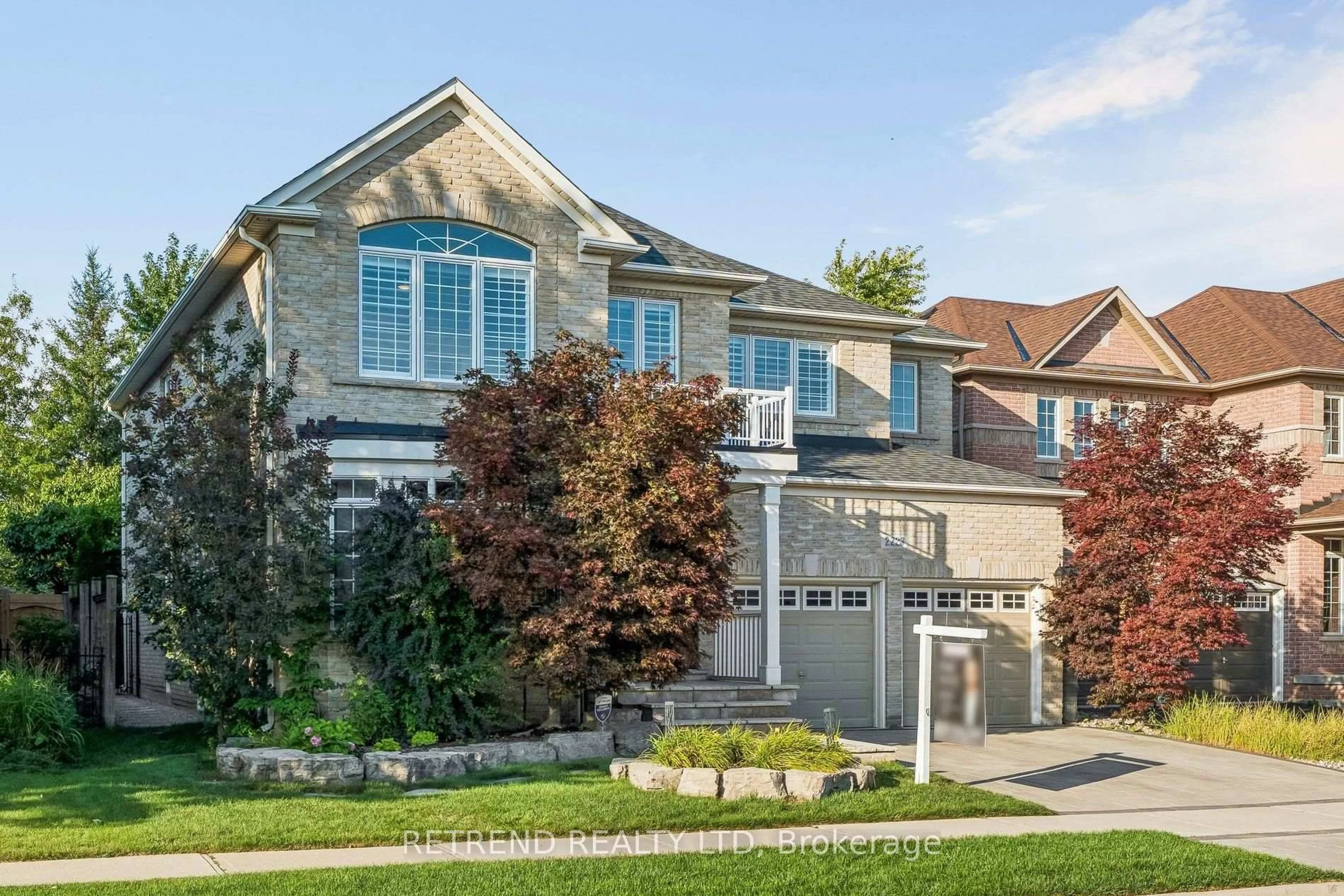 Home with brick exterior material, street for 2223 Wuthering Heights Way, Oakville Ontario L6M 0A3