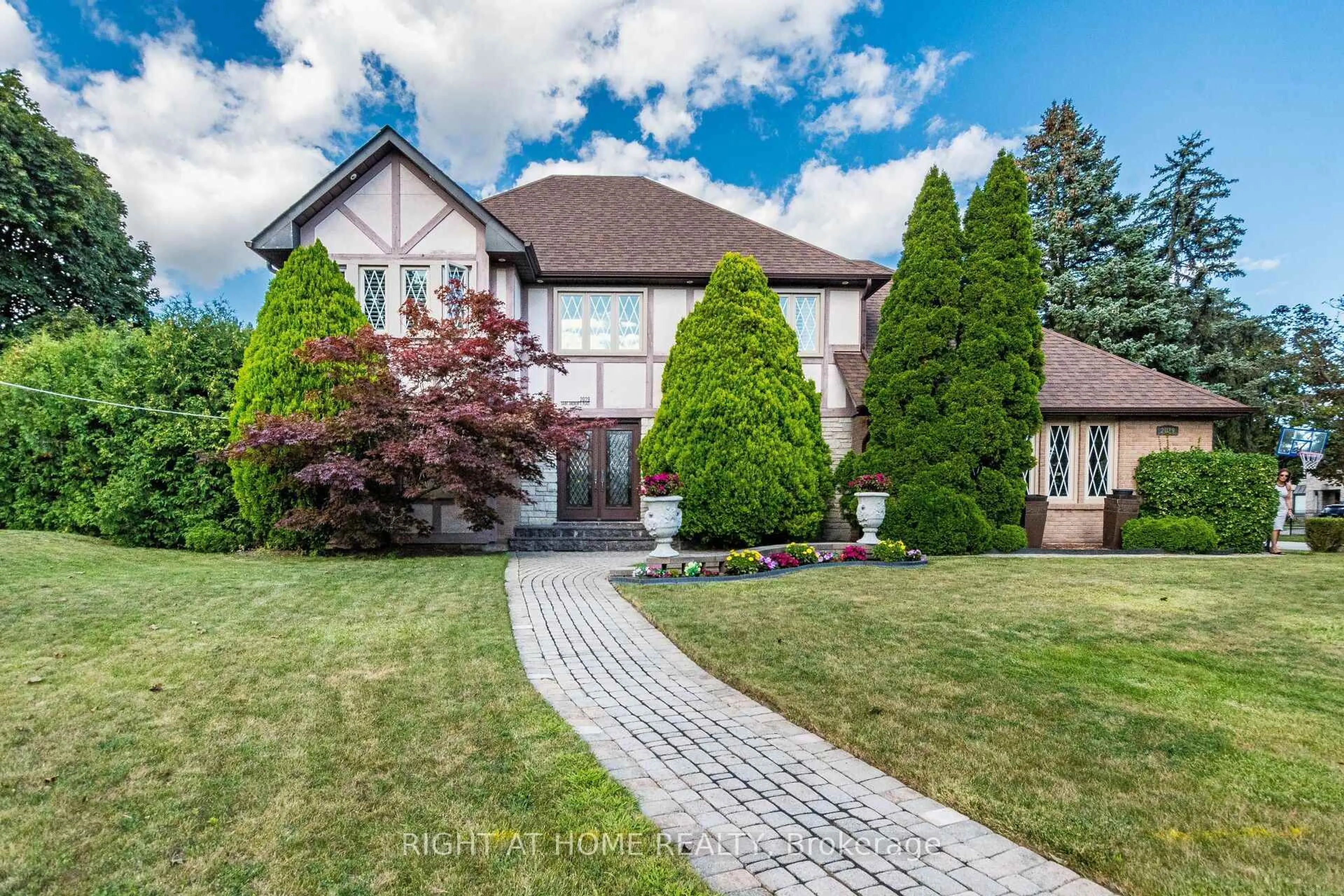 Home with brick exterior material, street for 2029 Saint Andrew's Pl, Mississauga Ontario L5H 4E5