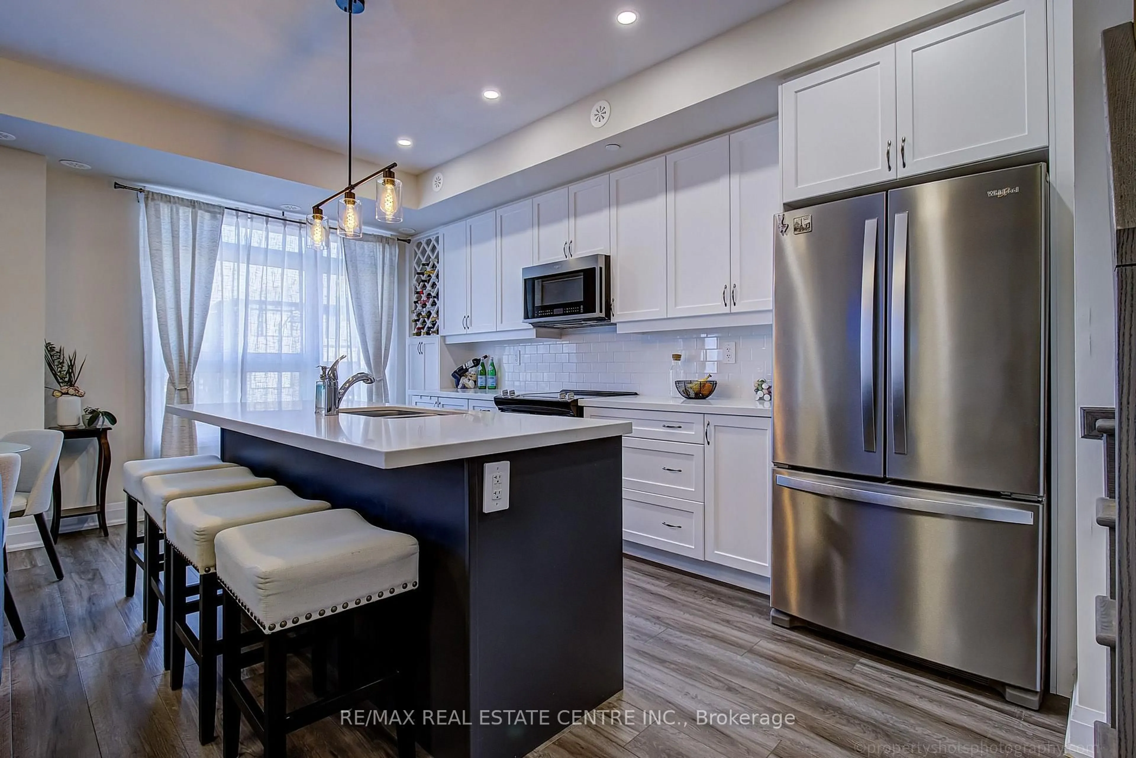 Open concept kitchen, ceramic/tile floor for 1569 Rose Way #116, Milton Ontario L9E 1N4