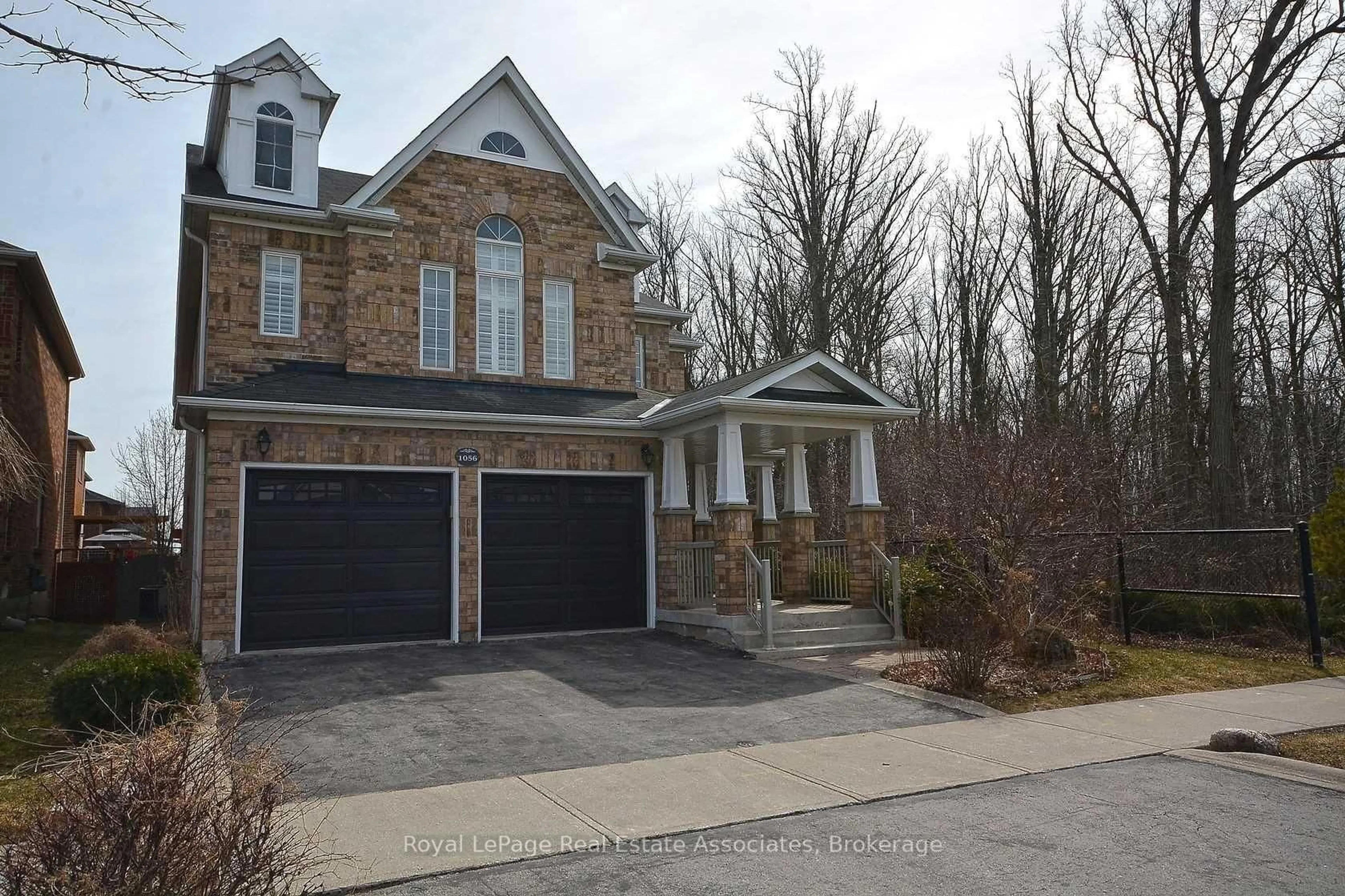 Home with brick exterior material, street for 1056 Woodward Ave, Milton Ontario L9T 5P4