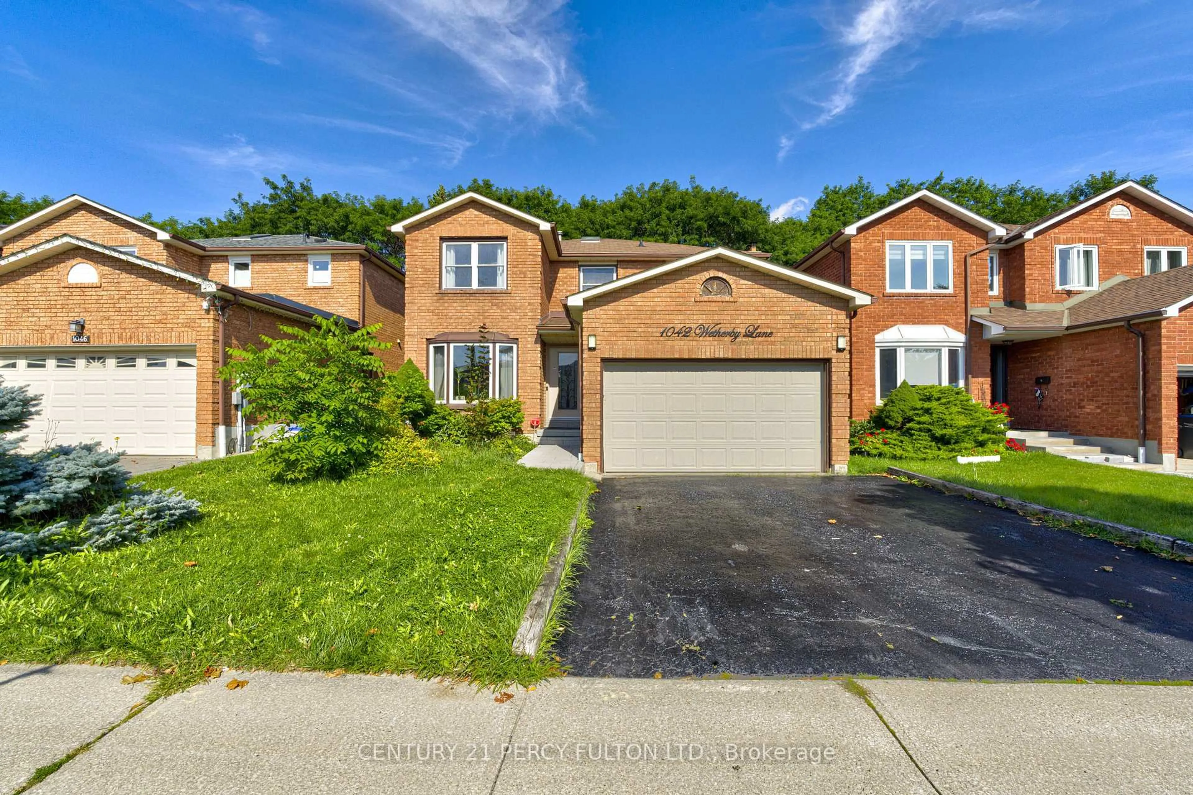 Home with brick exterior material, street for 1042 Wetherby Lane, Mississauga Ontario L4W 4R8