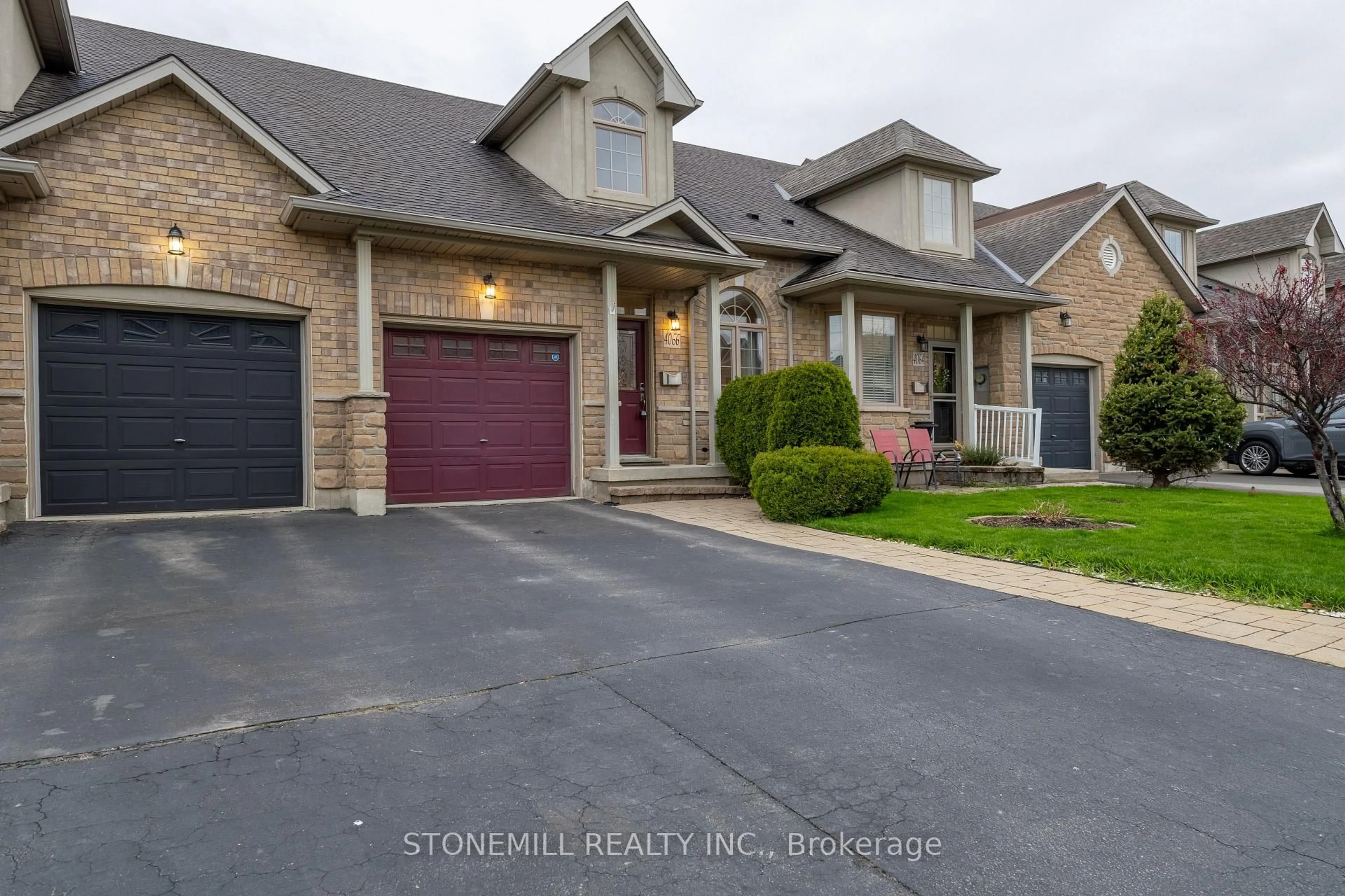 Home with brick exterior material, street for 4066 Medland Dr, Burlington Ontario L7M 4Z6