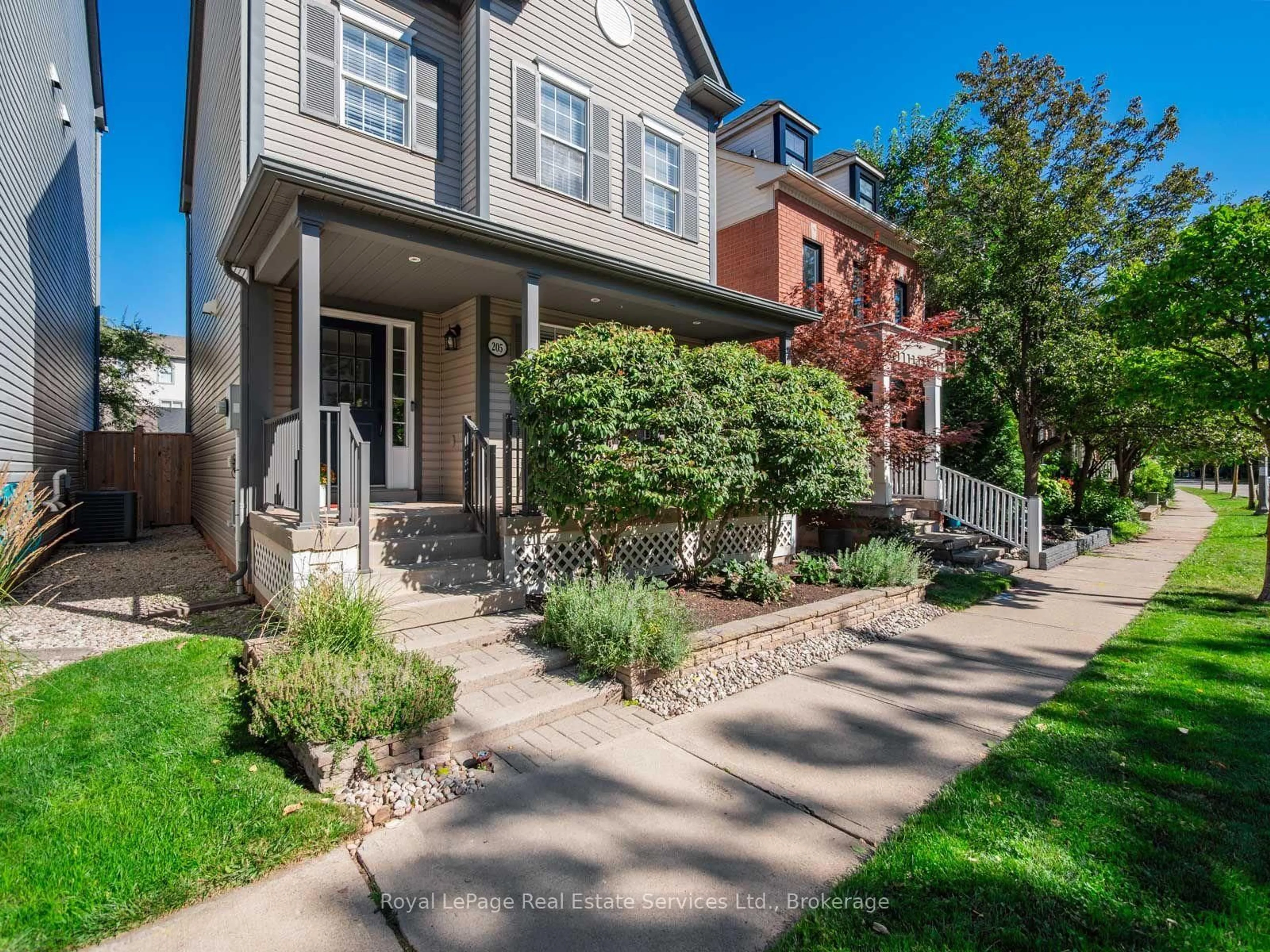 Home with brick exterior material, street for 205 Littlewood Dr, Oakville Ontario L6H 6T8