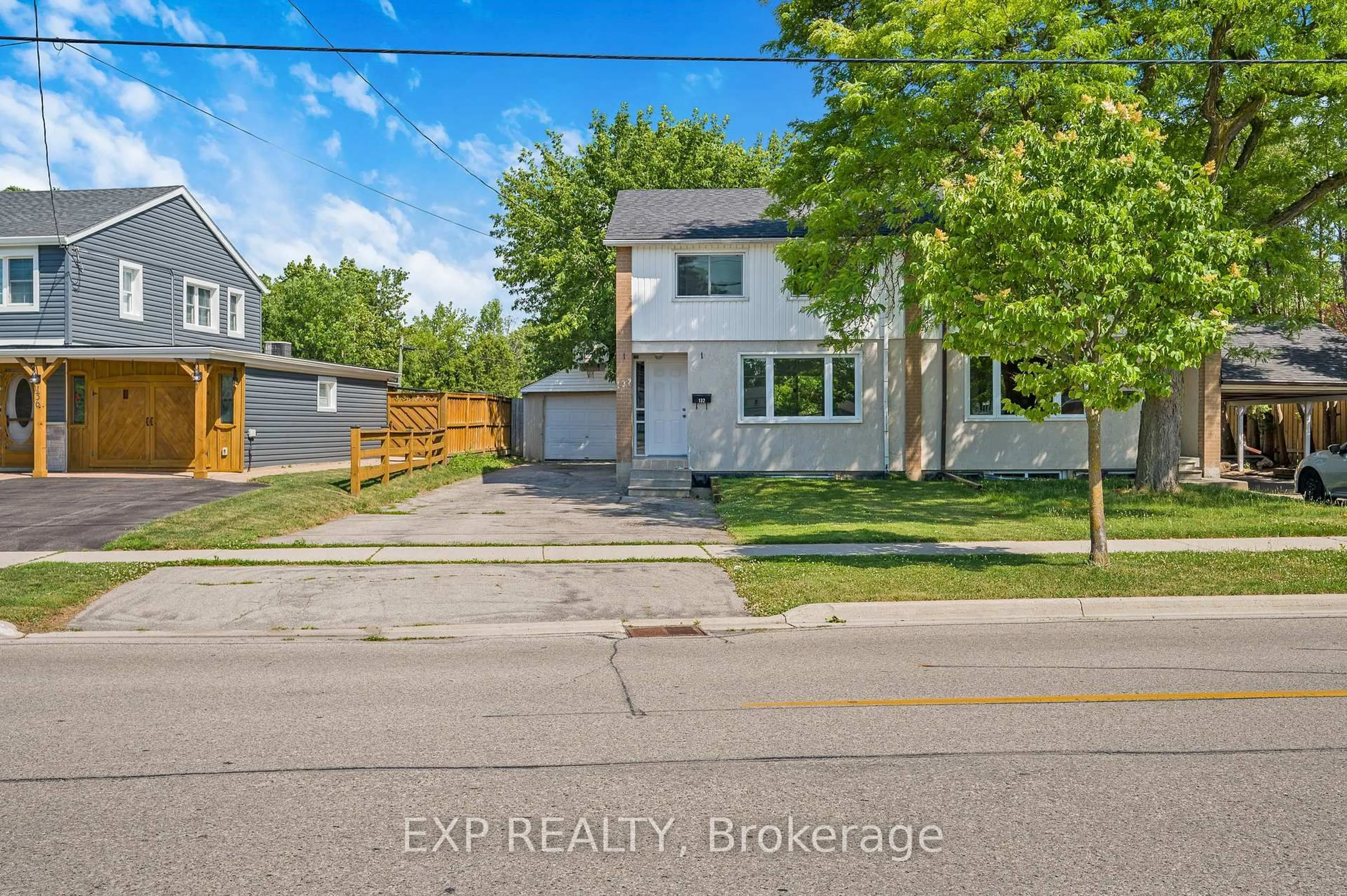 A pic from outside/outdoor area/front of a property/back of a property/a pic from drone, street for 132 Heslop Rd, Milton Ontario L9T 1B4