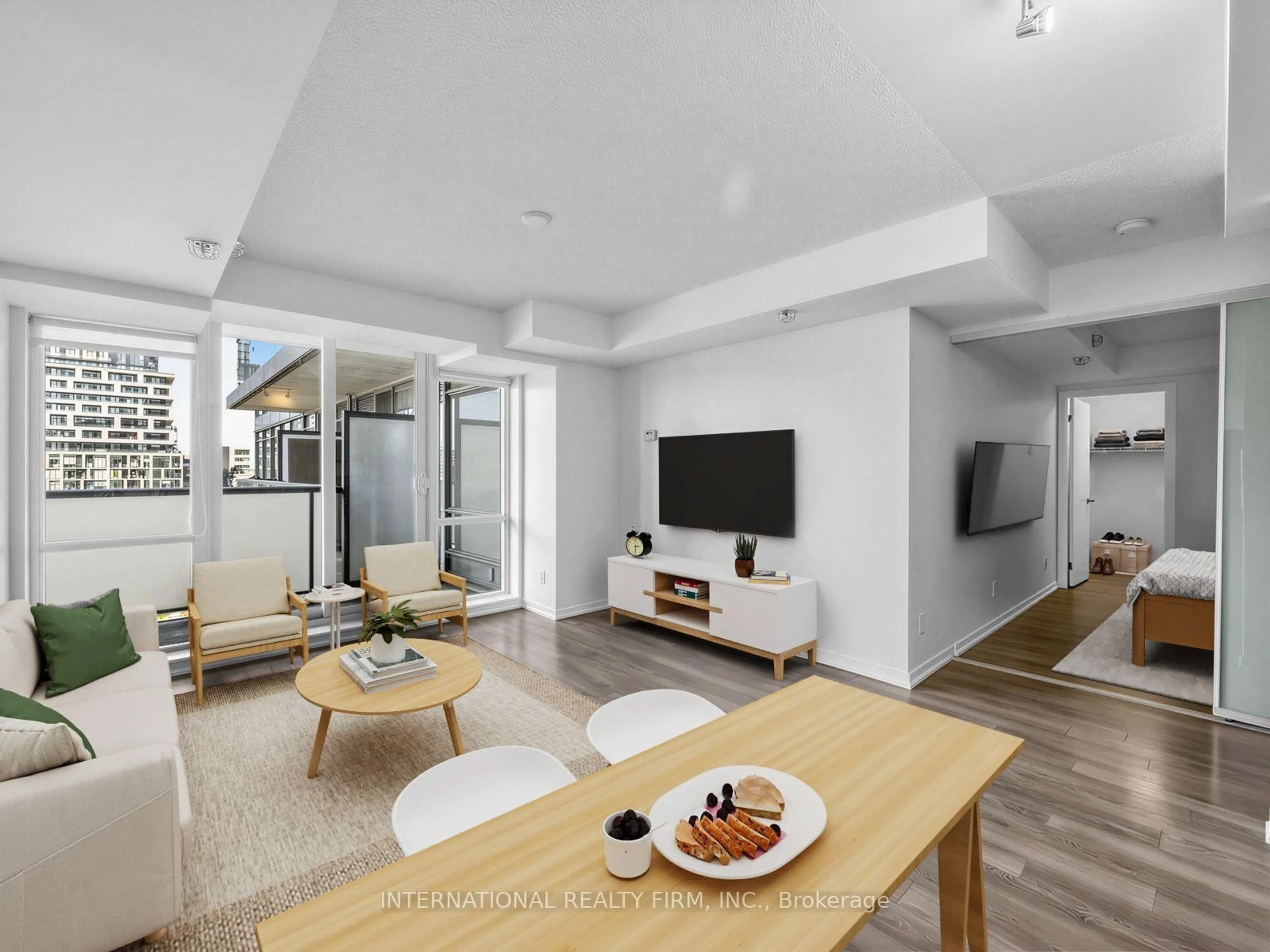 Living room with furniture, unknown for 20 Joe Shuster Way #516, Toronto Ontario M6K 0A3