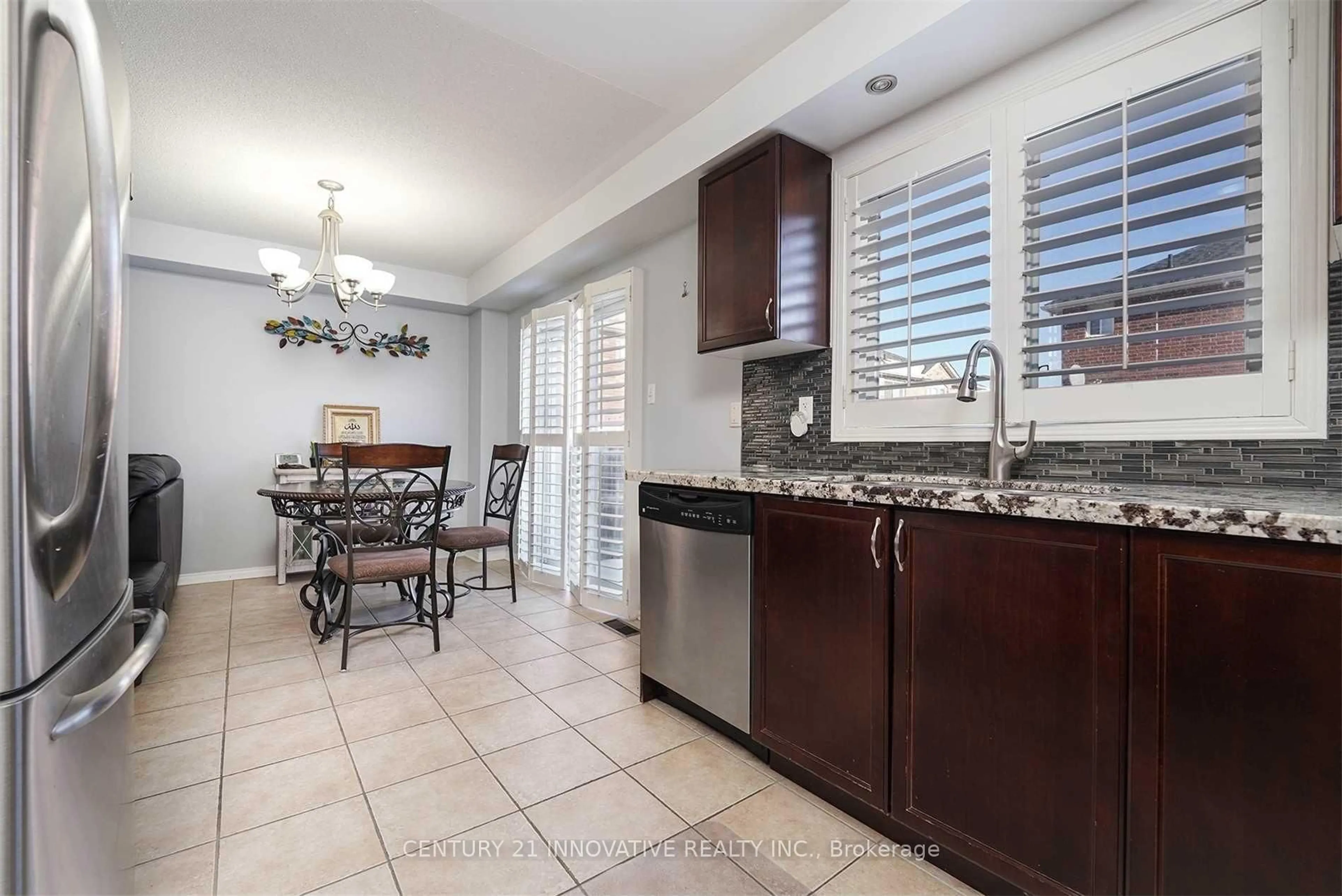 Open concept kitchen, ceramic/tile floor for 97 Hollingsworth Circ, Brampton Ontario L7A 0J5