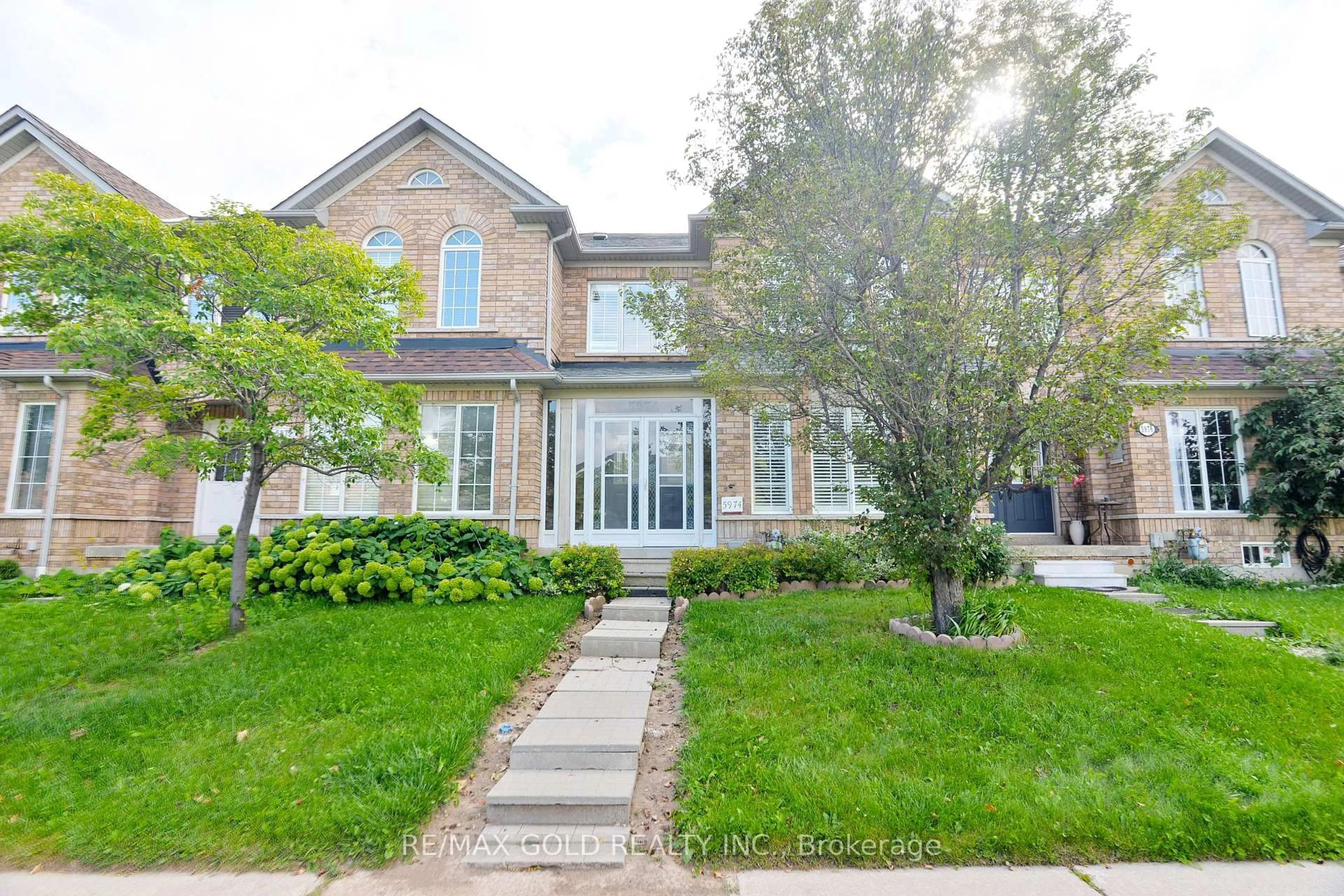 Home with brick exterior material, street for 5974 Tenth Line, Mississauga Ontario L5M 6S9