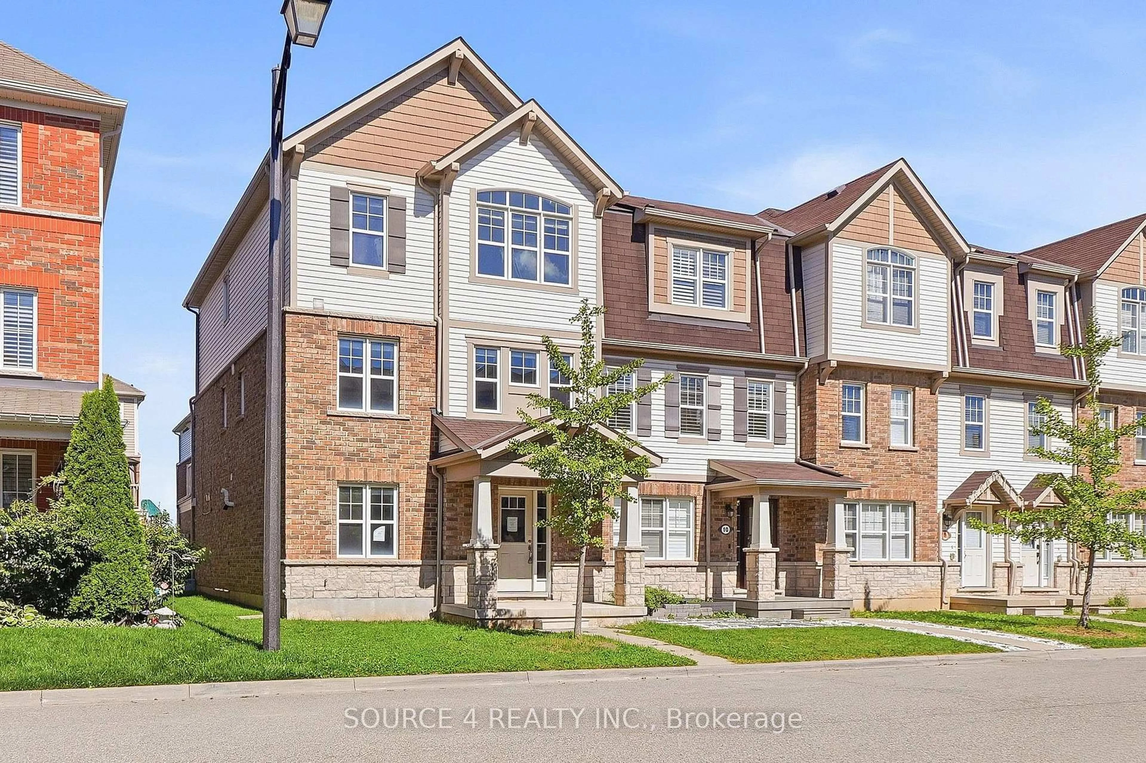 Home with brick exterior material, street for 12 Tight Crt, Milton Ontario L9T 8S3