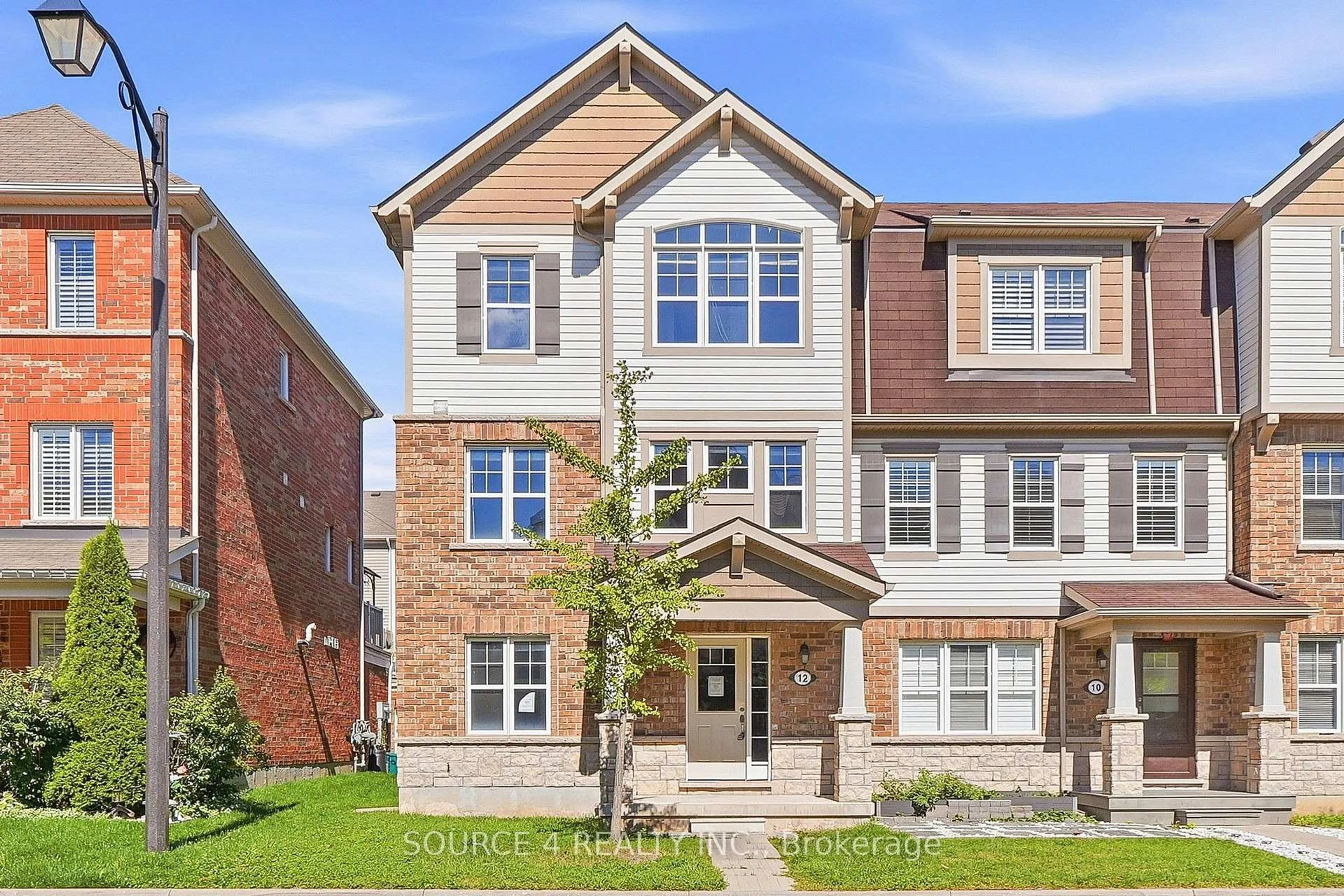 Home with brick exterior material, street for 12 Tight Crt, Milton Ontario L9T 8S3