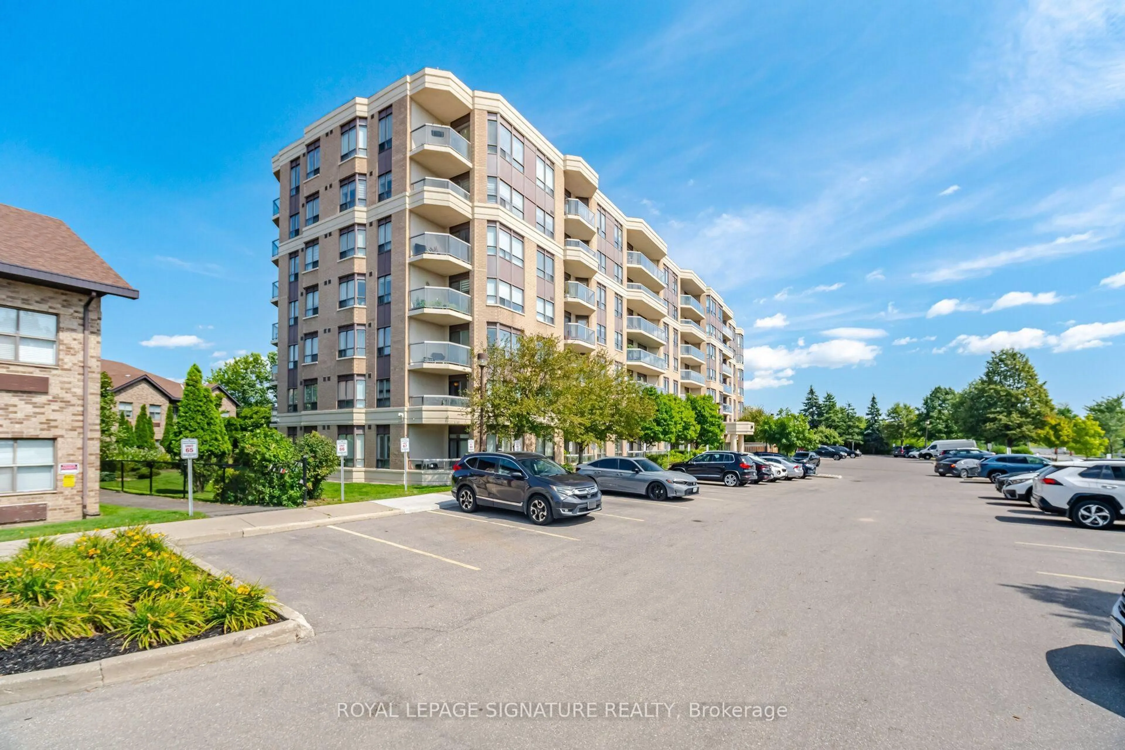 A pic from outside/outdoor area/front of a property/back of a property/a pic from drone, unknown for 300 Ray Lawson Blvd #313, Brampton Ontario L6Y 5H5
