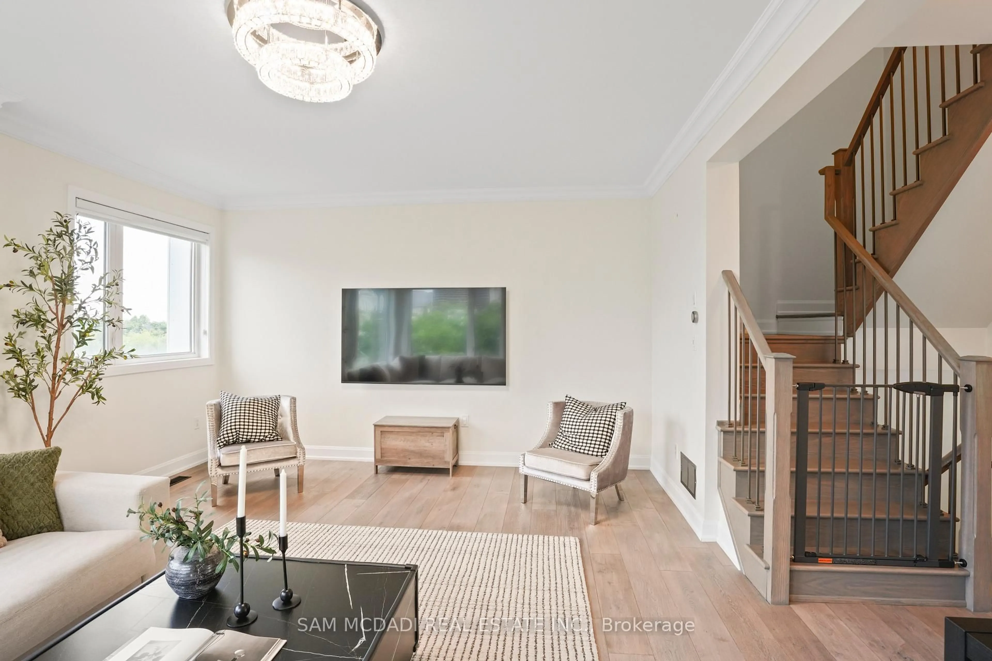 Living room with furniture, wood/laminate floor for 3006 Creekshore Common #34, Oakville Ontario L6M 0Y6
