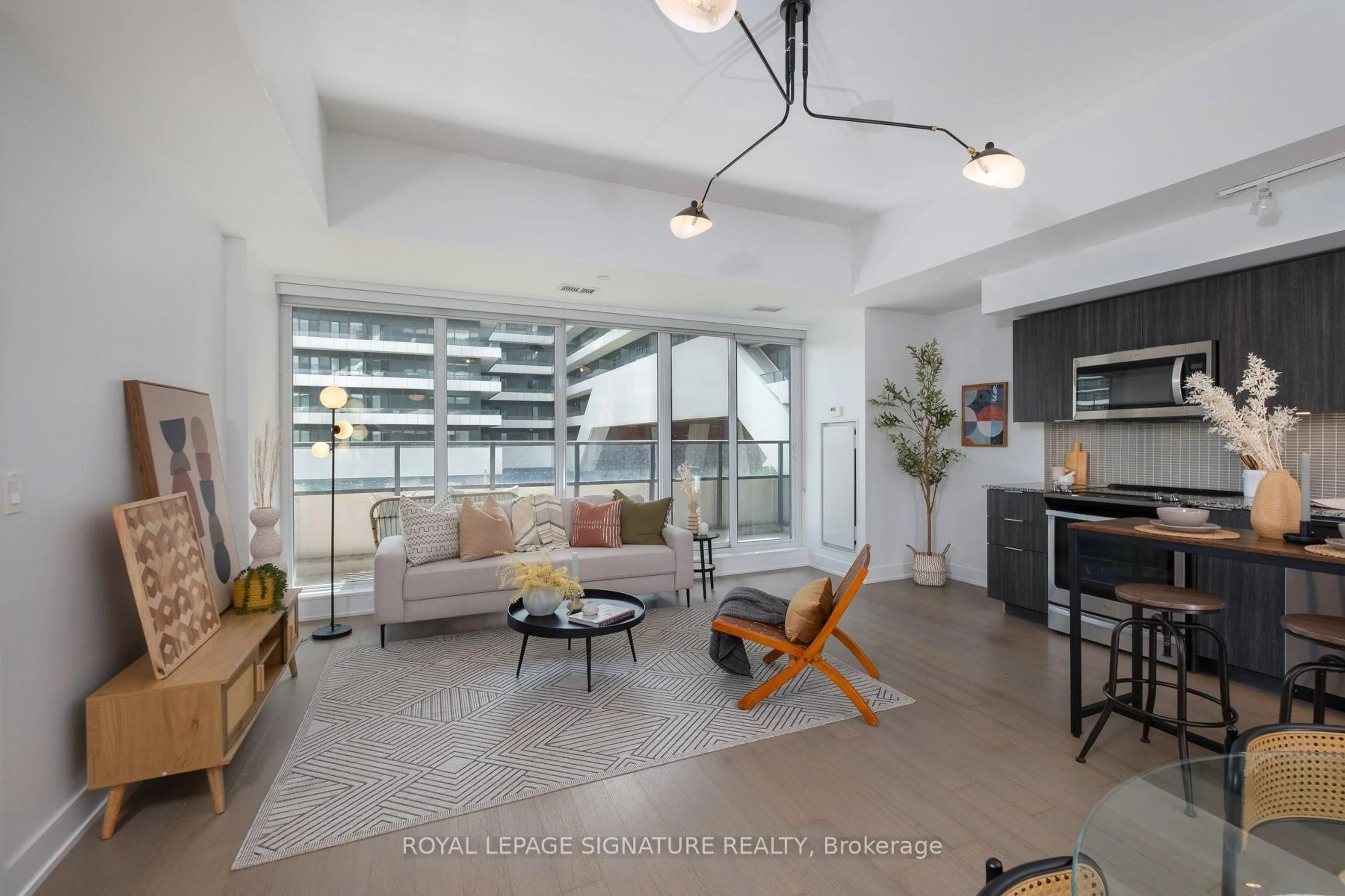 Living room with furniture, unknown for 30 Shore Breeze Dr #230, Toronto Ontario M8V 1A1