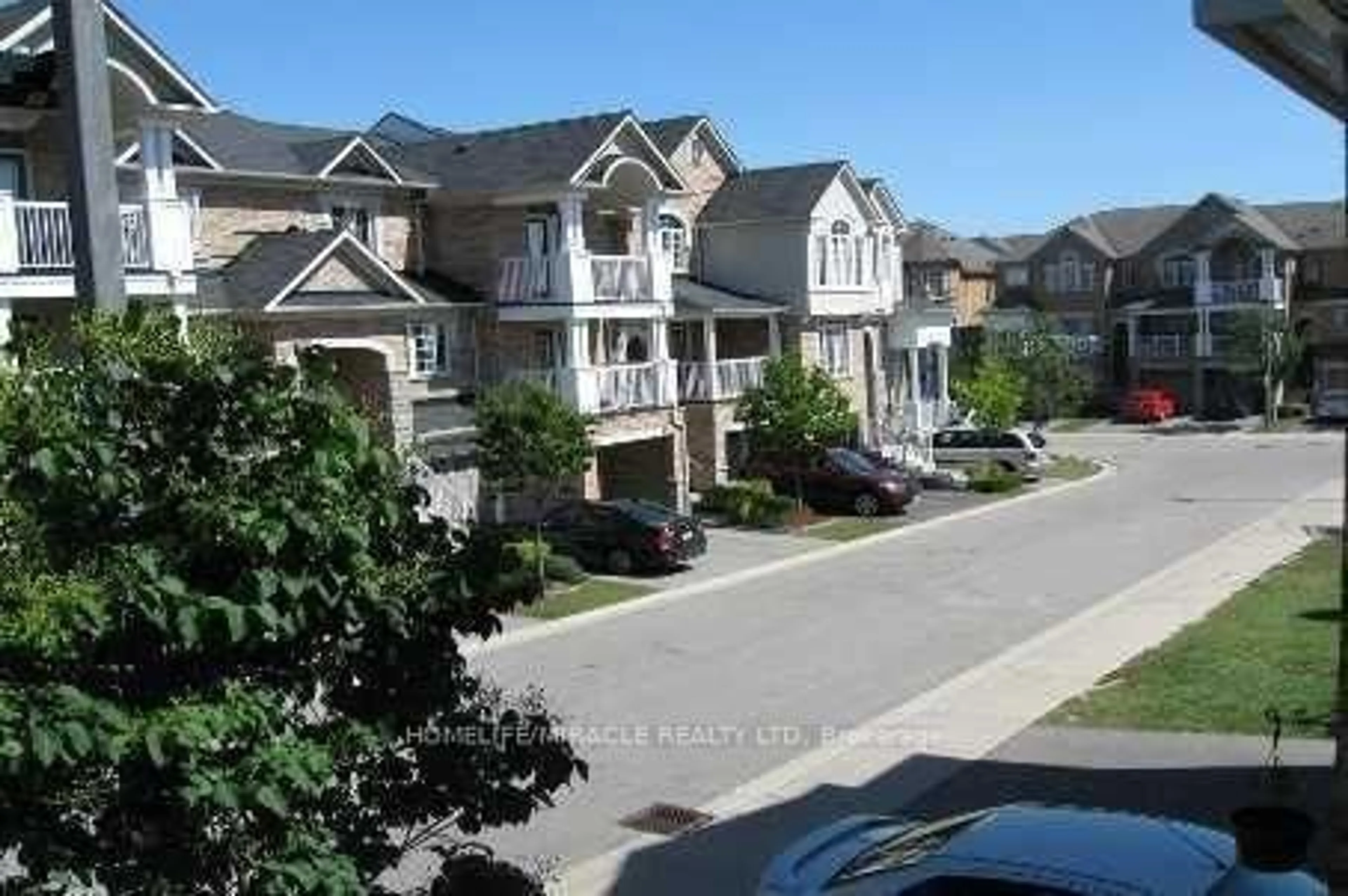 A pic from outside/outdoor area/front of a property/back of a property/a pic from drone, street for 601 Shoreline Dr #106, Mississauga Ontario L5B 4K8