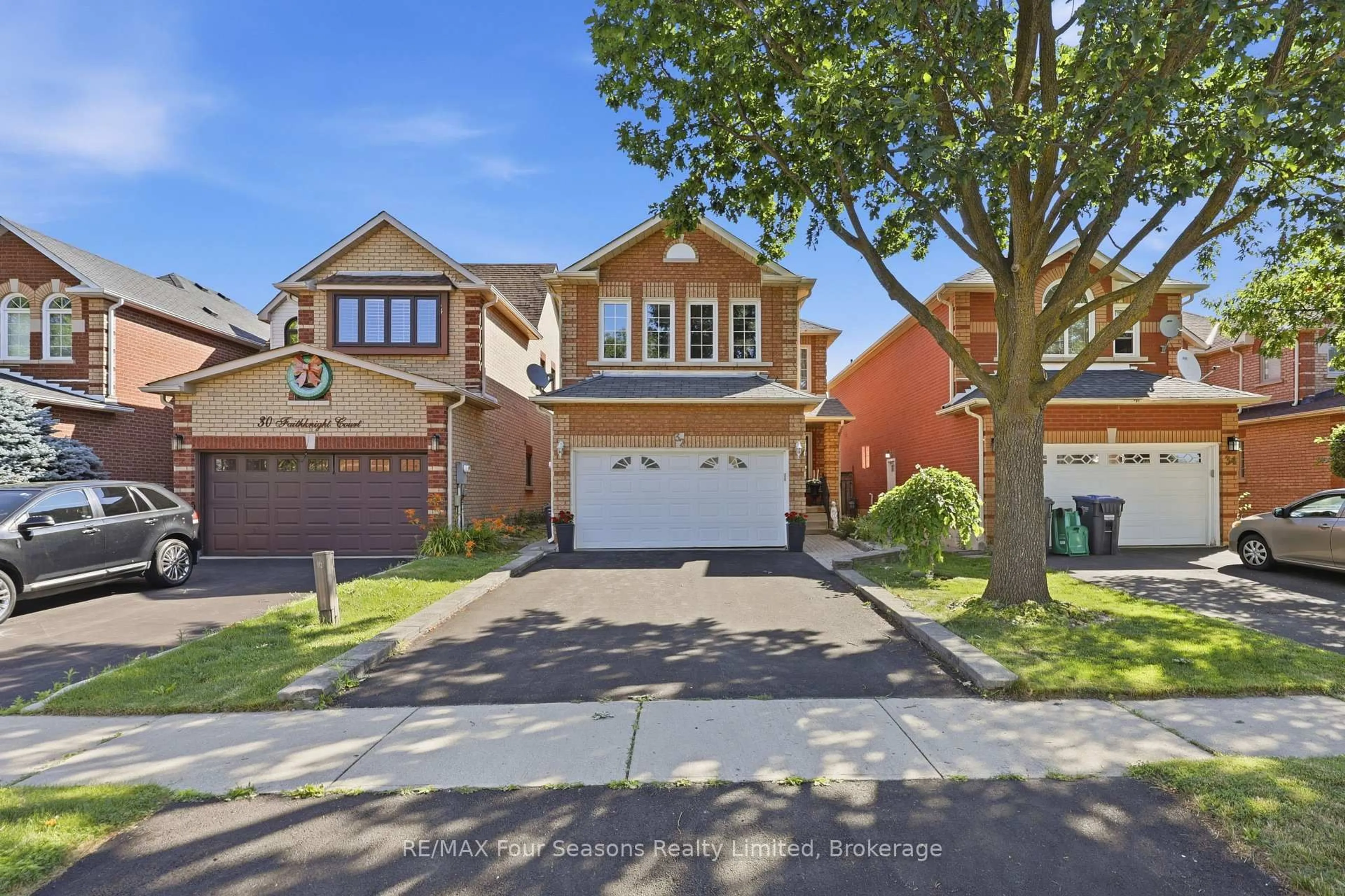 Home with brick exterior material, street for 32 Faithknight Crt, Brampton Ontario L7A 1H9