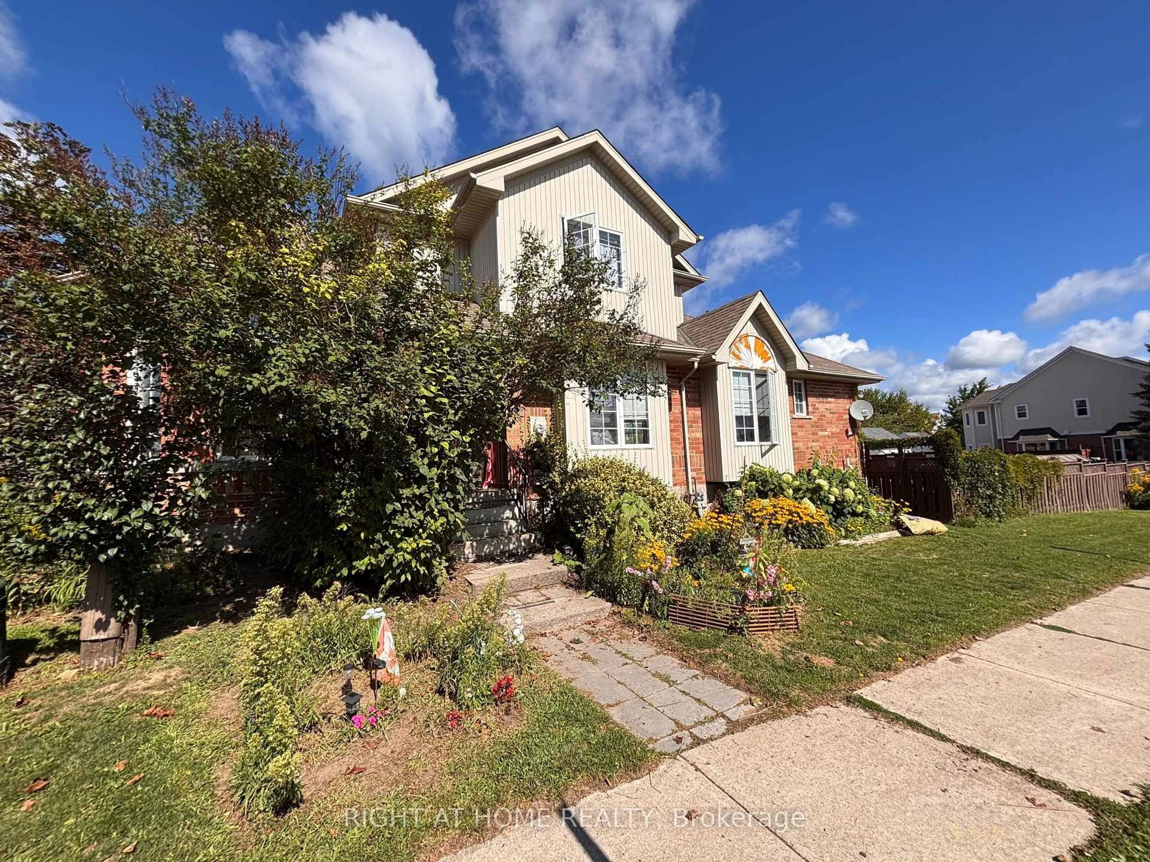 Home with brick exterior material, street for 1 Montgomery Blvd, Orangeville Ontario L9W 5H6