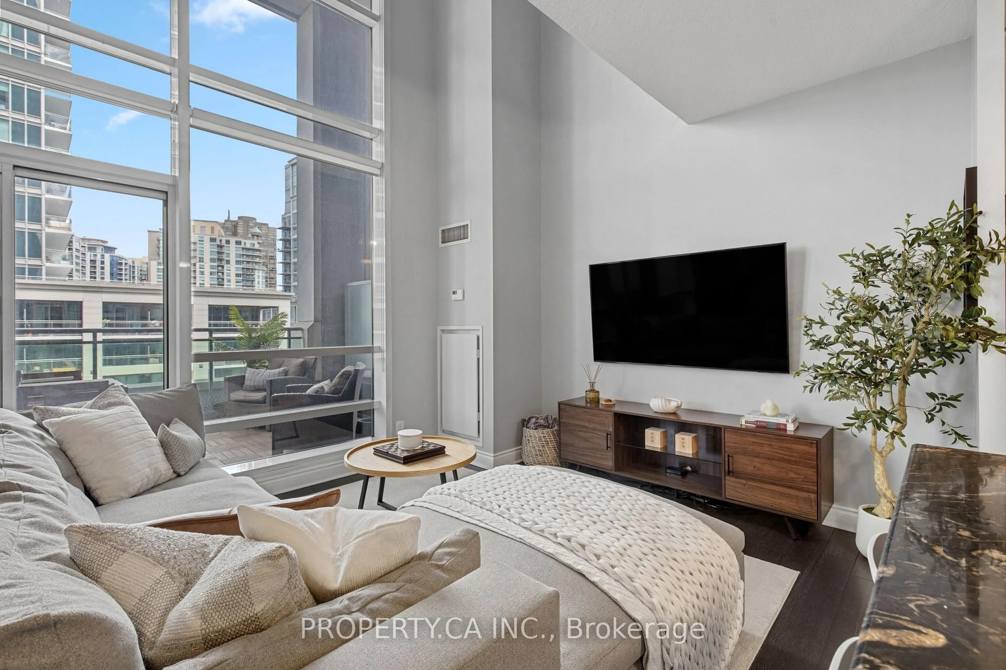Living room with furniture, unknown for 16 Brookers Lane #211, Toronto Ontario M8V 0A5