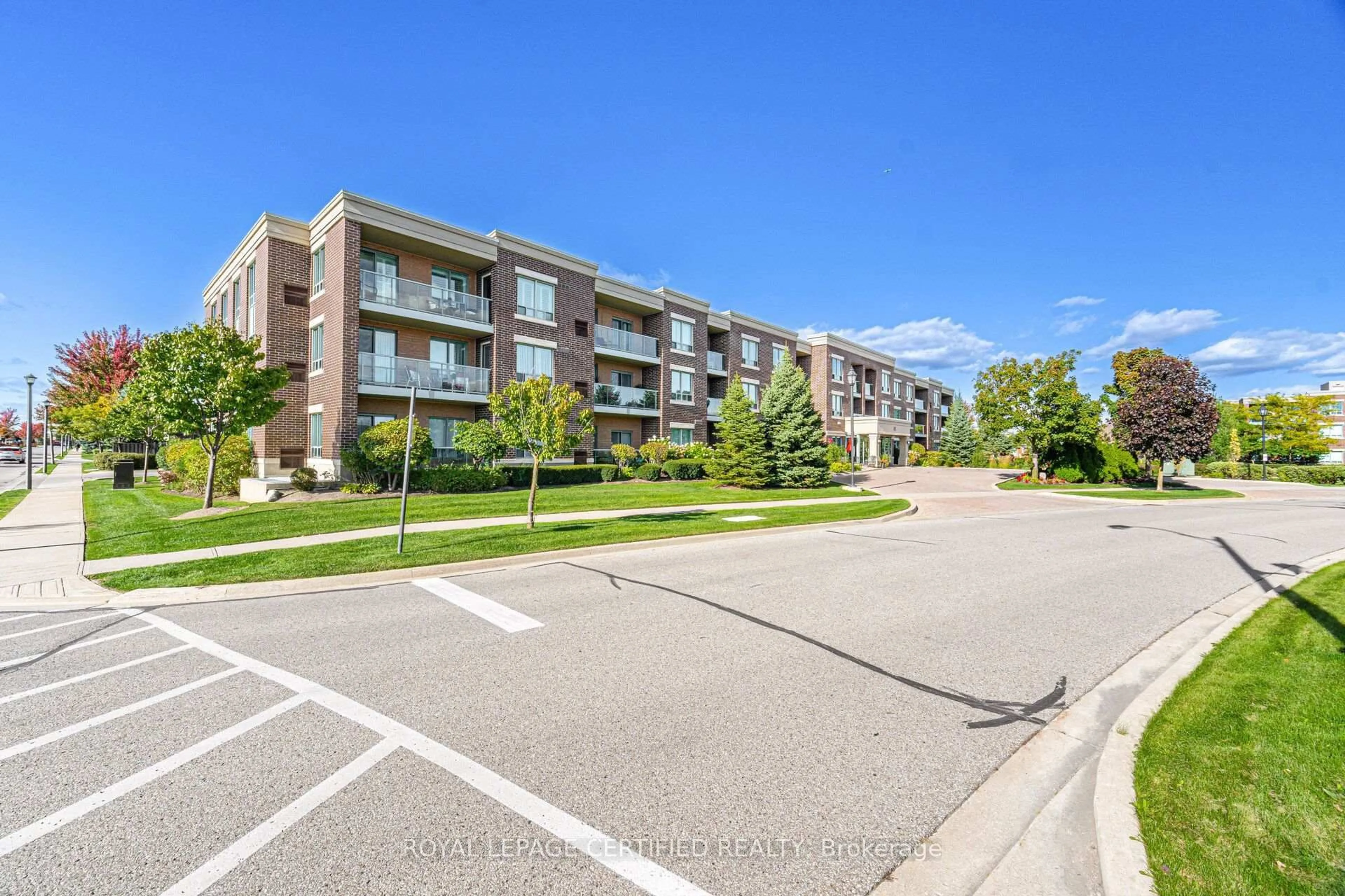 A pic from outside/outdoor area/front of a property/back of a property/a pic from drone, street for 65 Via Rosedale #106, Brampton Ontario L6R 3N8
