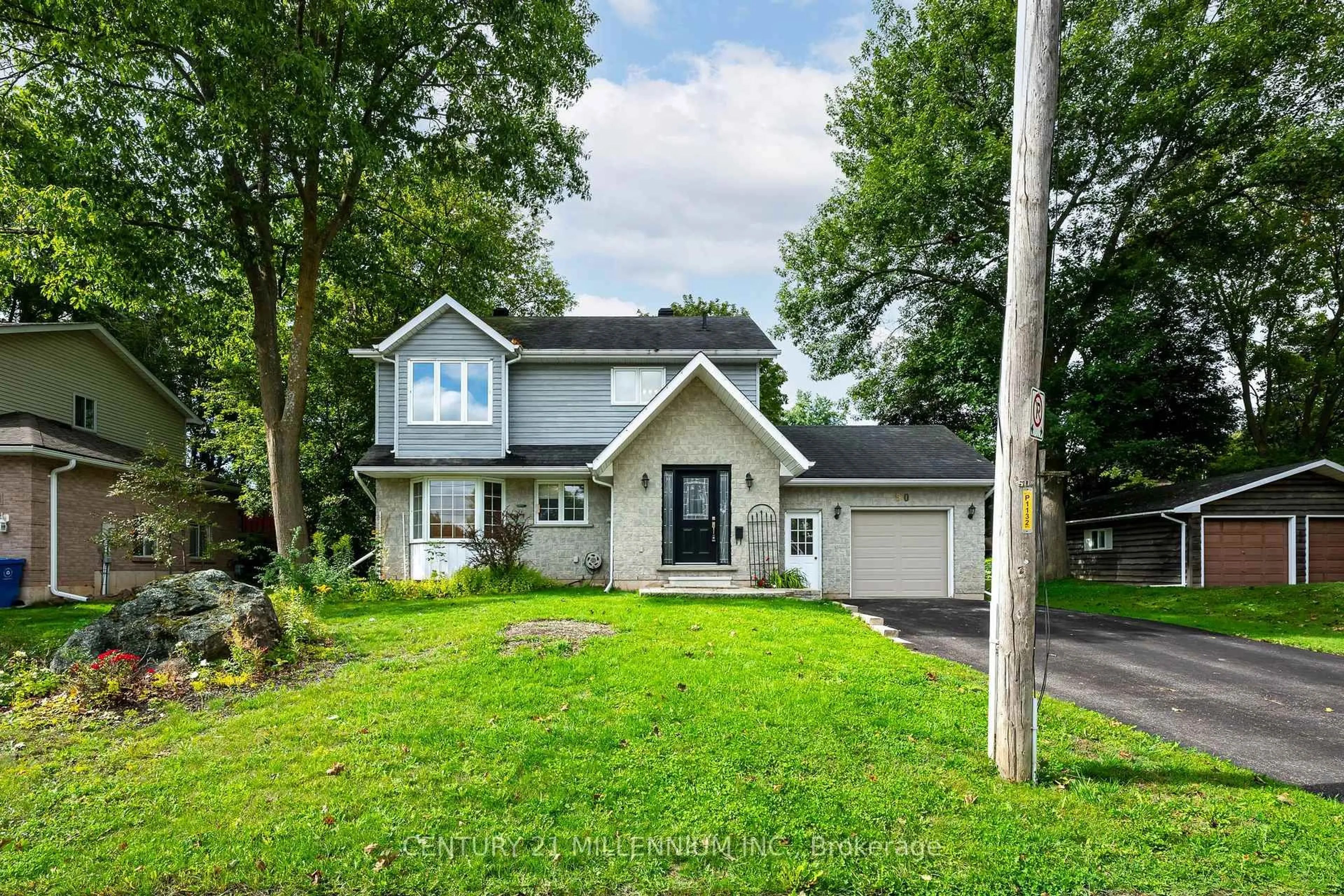 Home with vinyl exterior material, street for 50 Margaret St, Orangeville Ontario L9W 2N6