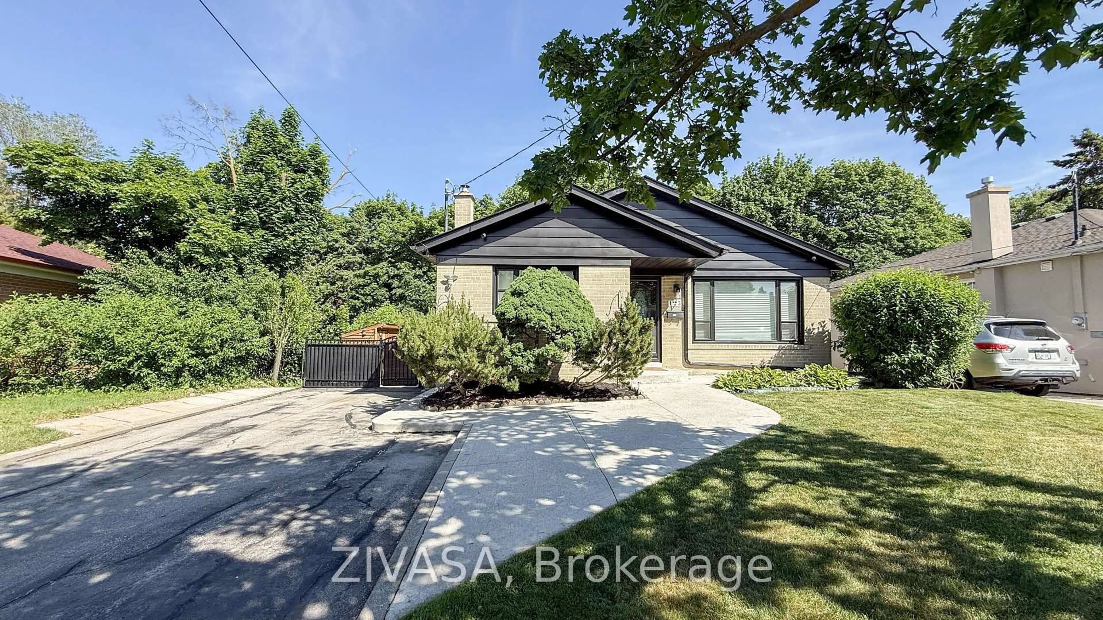 Home with brick exterior material, street for 125 Jeffcoat Dr, Toronto Ontario M9W 3B9