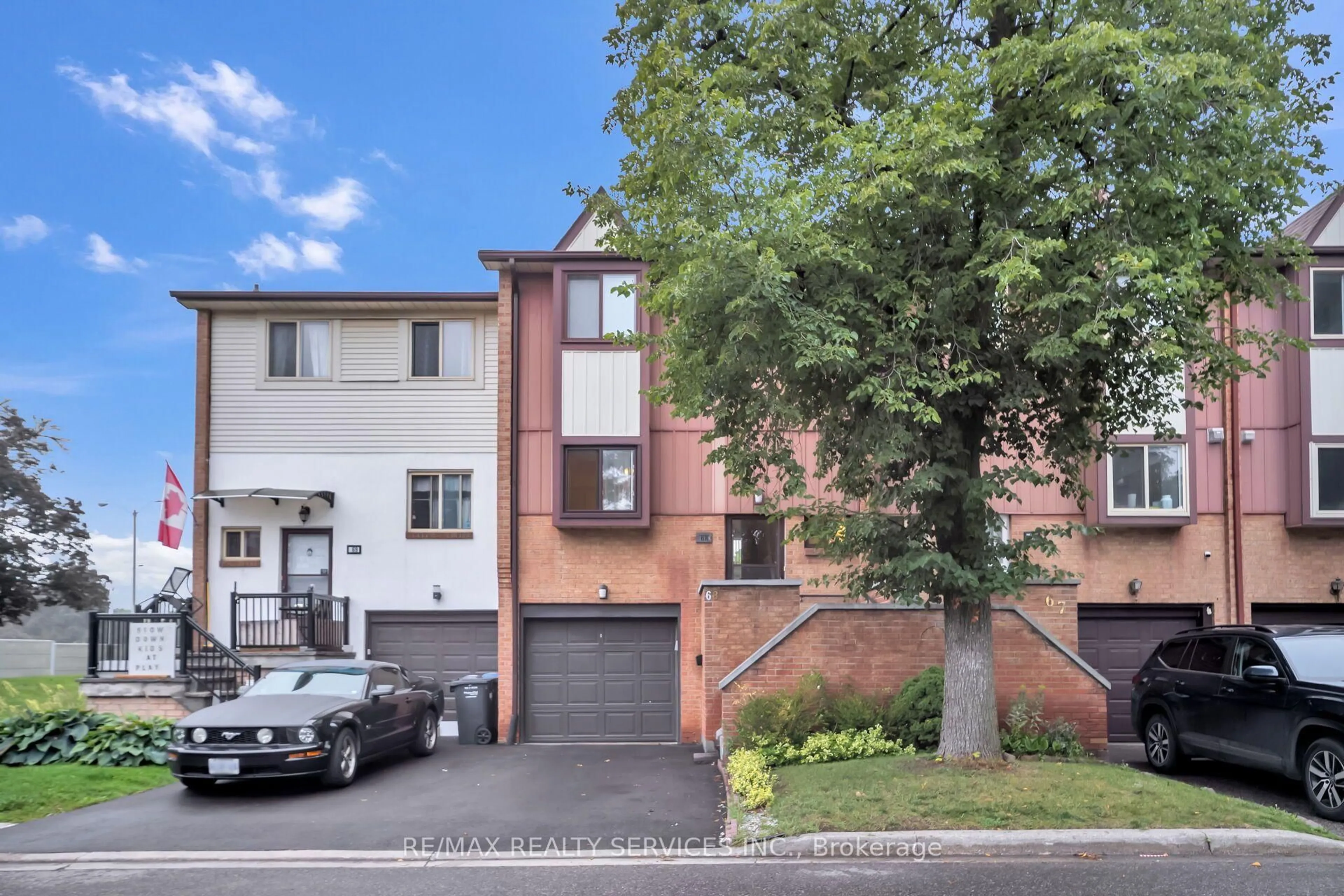 A pic from outside/outdoor area/front of a property/back of a property/a pic from drone, street for 68 Baronwood Crt #68, Brampton Ontario L6V 3H7