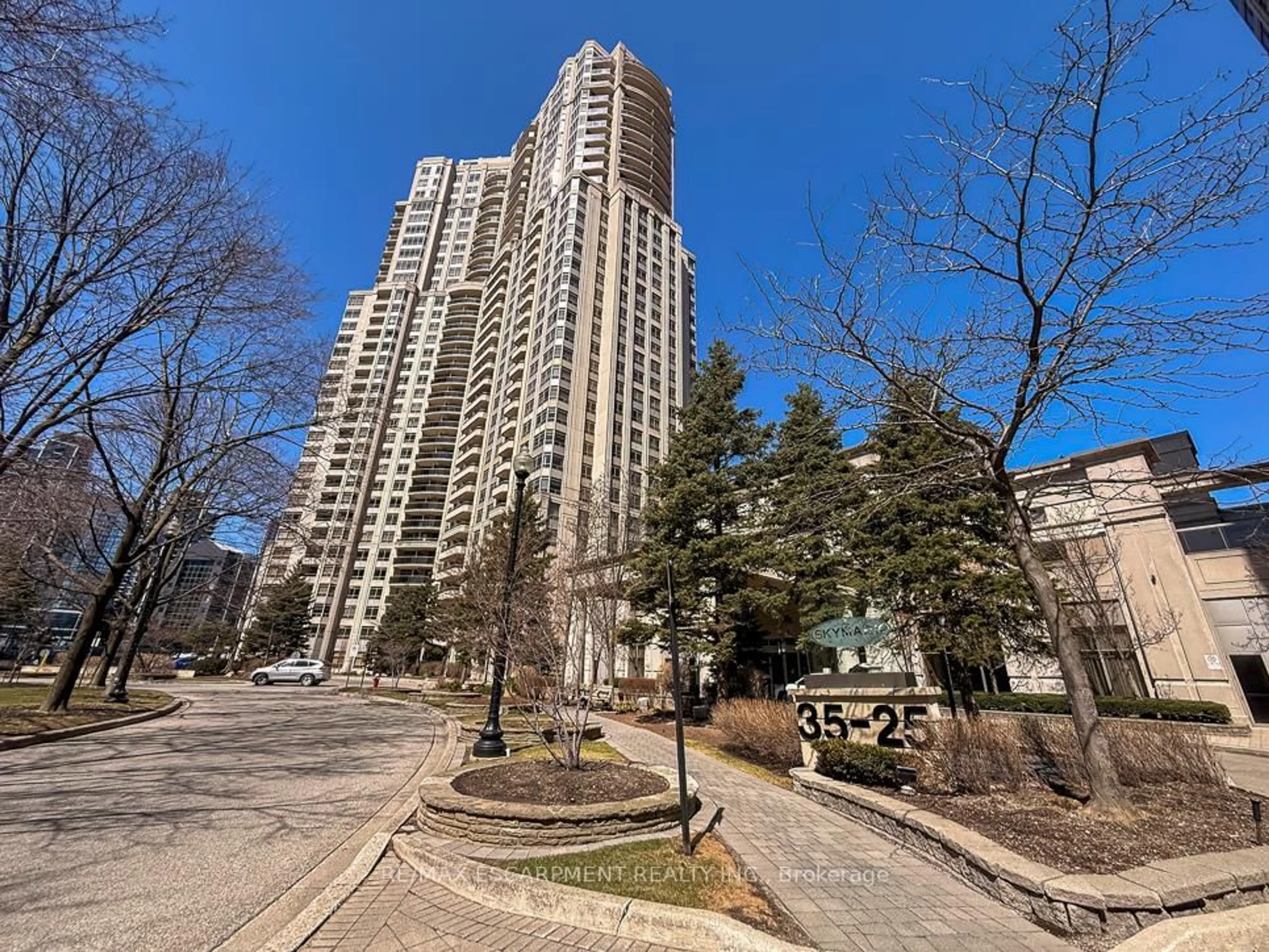 Patio, city buildings view from balcony for 35 Kingsbridge Garden Circ #2706, Mississauga Ontario L5R 3Z3