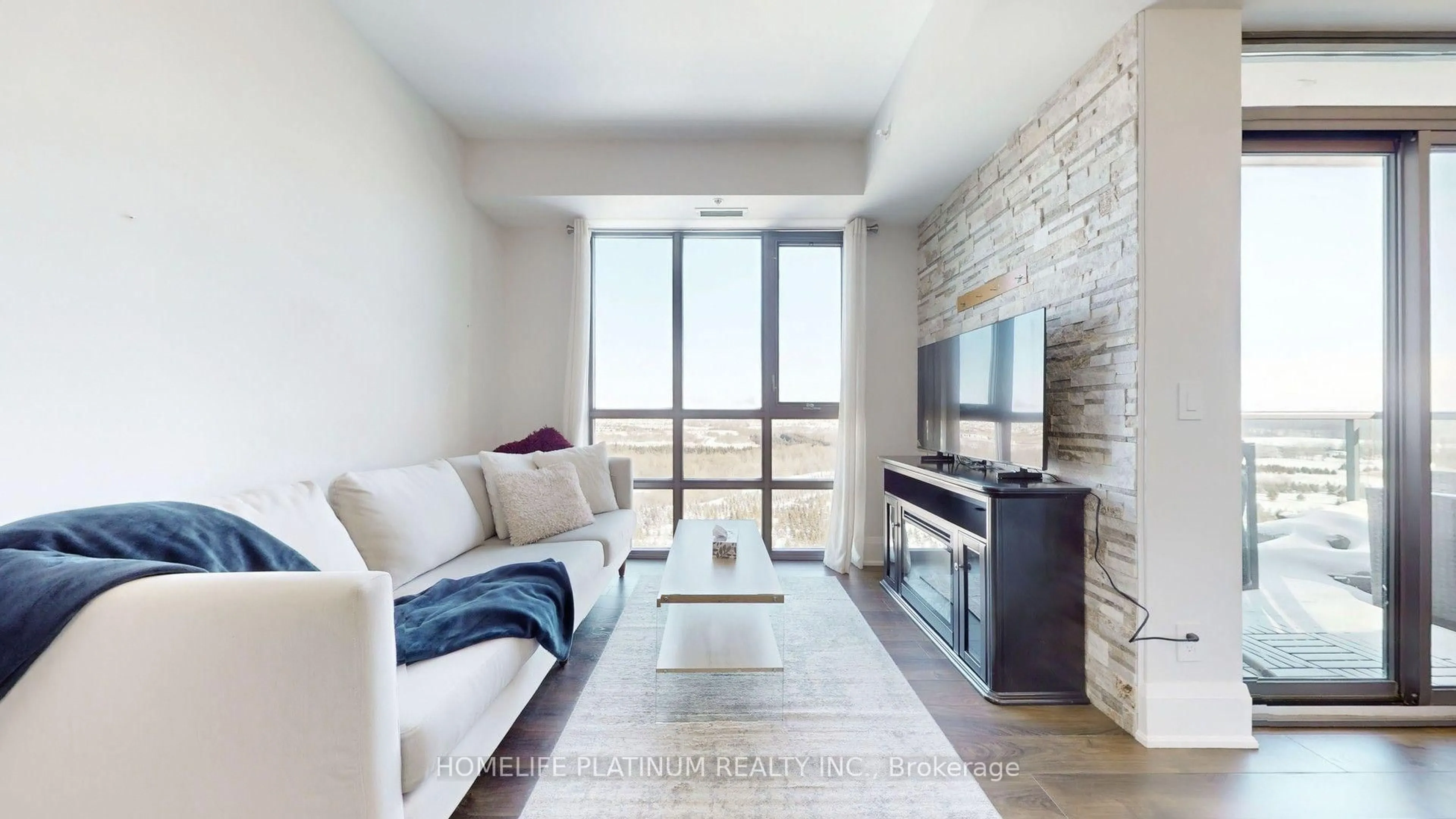 Living room with furniture, ceramic/tile floor for 45 Yorkland Blvd #1106, Brampton Ontario L6P 4B4