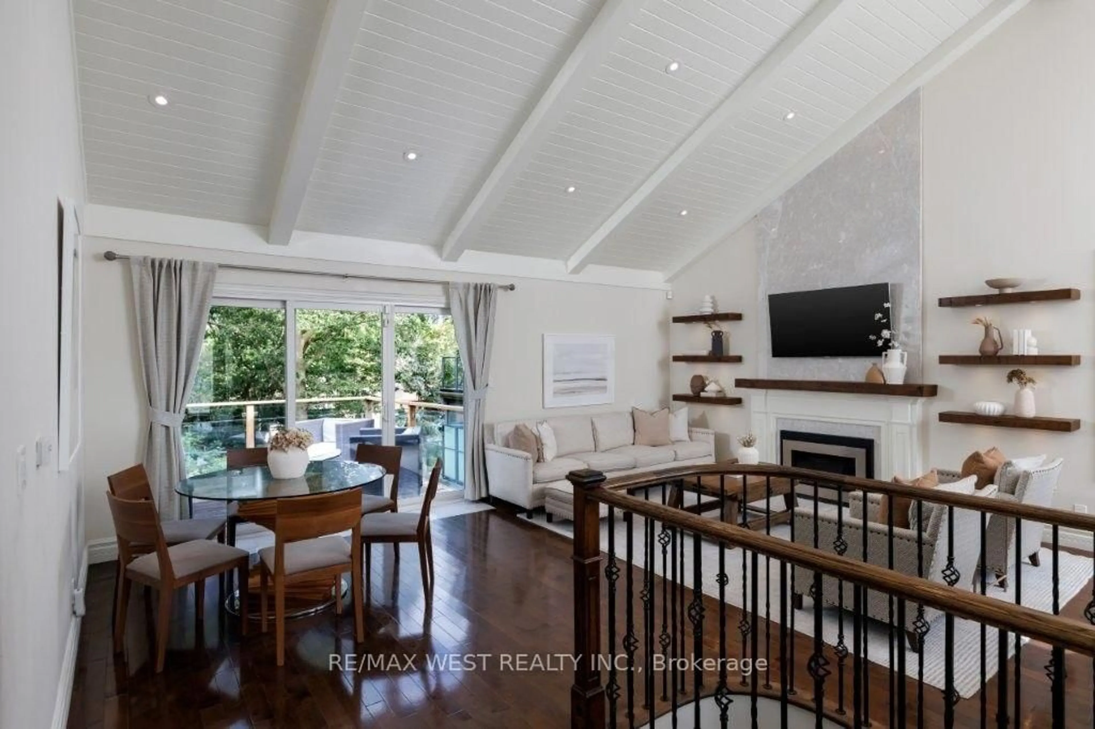 Living room with furniture, wood/laminate floor for 4653 Dundas St, Toronto Ontario M9A 1A4